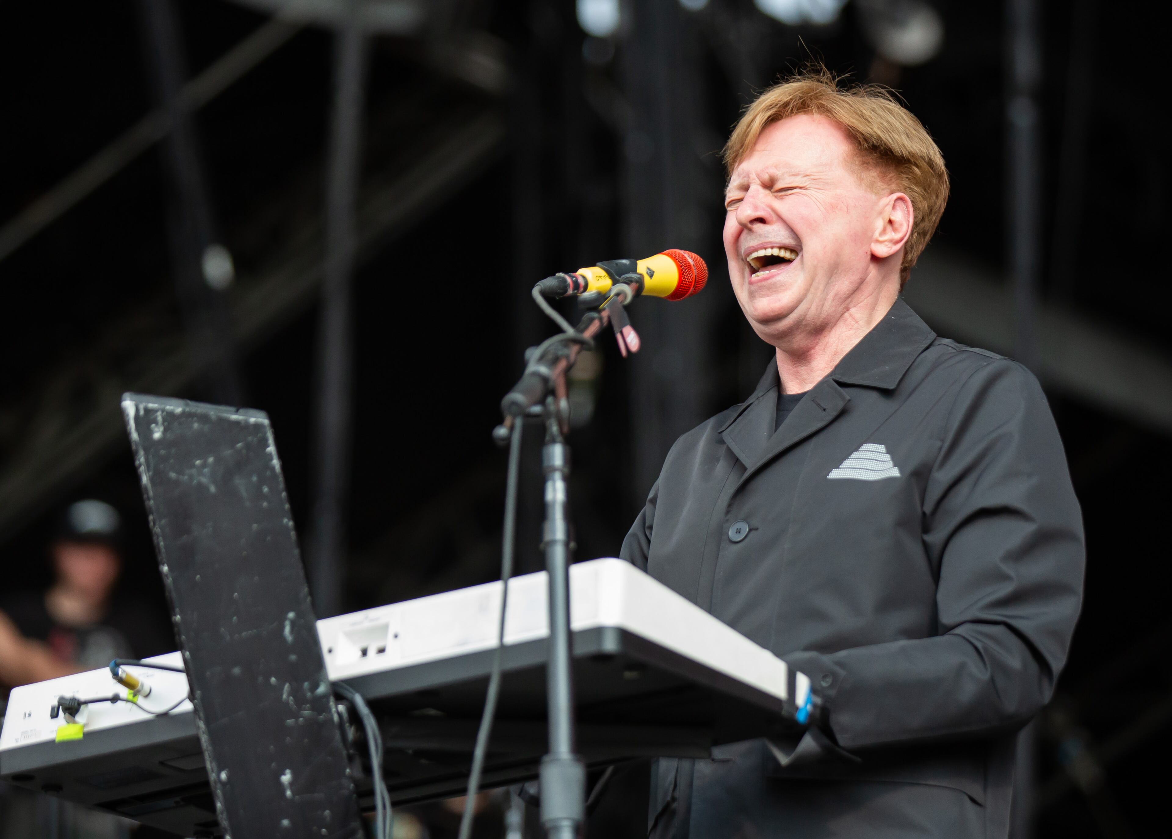 Atlanta, Ga. — New wave legends Devo took the Peachtree Stage and played classics like "Whip It" for adoring fans on Sunday, Sept. 21, 2025, at Piedmont Park. (RYAN FLEISHER FOR THE ATLANTA JOURNAL-CONSTITUTION)