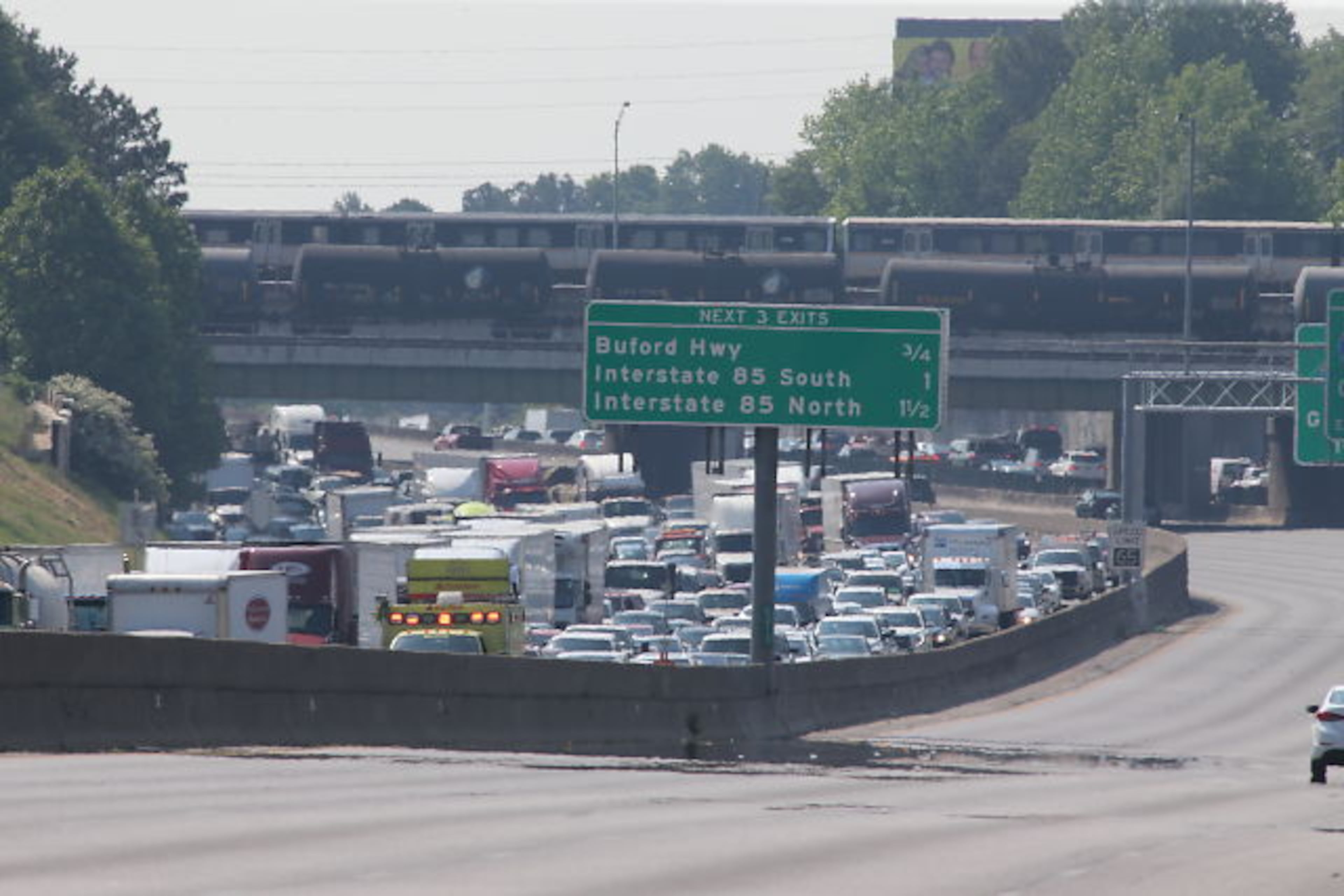 Scene from small plane crash at Peachtree Industrial and I-285 on Friday, May 8, 2015.