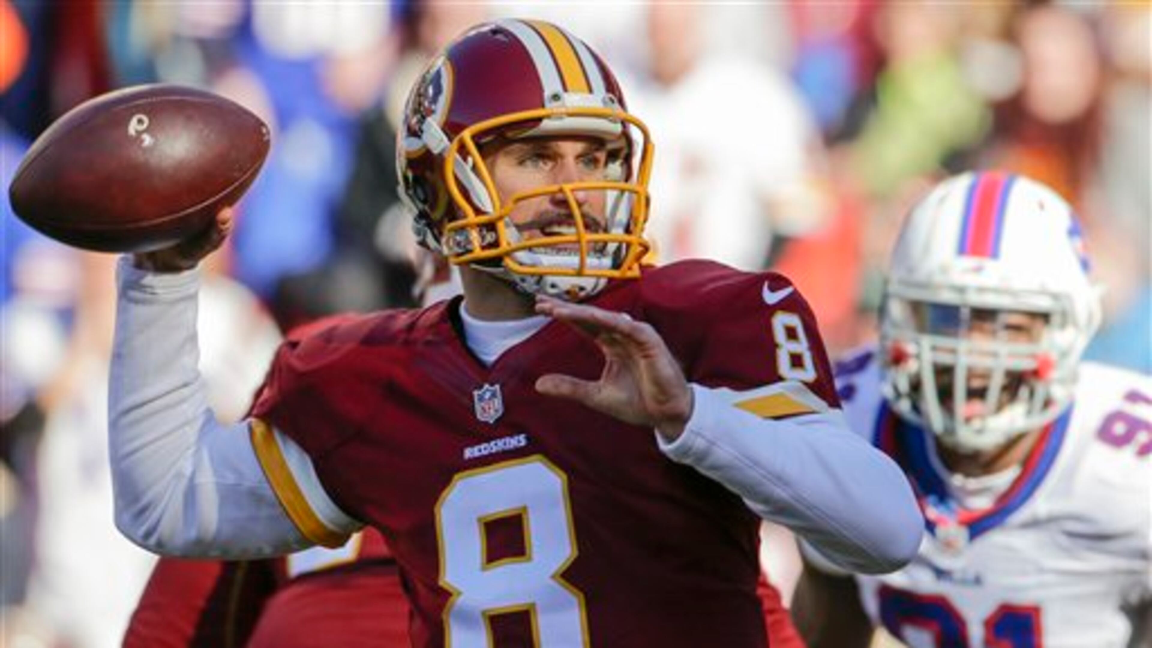 In this Dec. 20, 2015, photo, Washington Redskins quarterback Kirk Cousins (8) passes the ball during the first half of an NFL football game against the Buffalo Bills in Landover, Md. Forget about complicated playoff permutations. It's suddenly all become so simple for the Washington Redskins: Win their game against the Philadelphia Eagles next weekend, and coach Jay Gruden's club will clinch the NFC East title. (AP Photo/Mark Tenally)