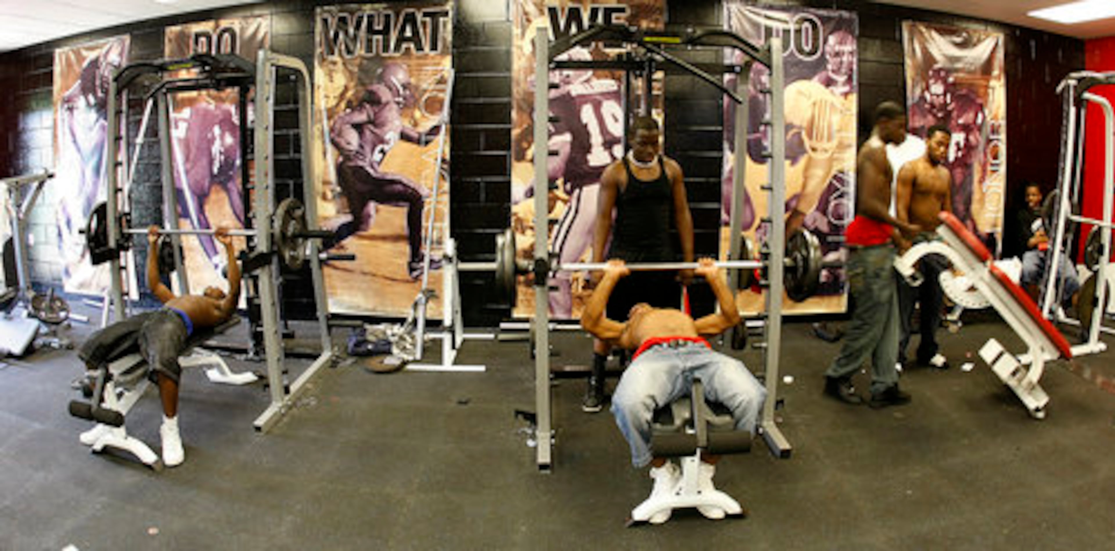 Greenville High School football players work out in their newly renovated field house.