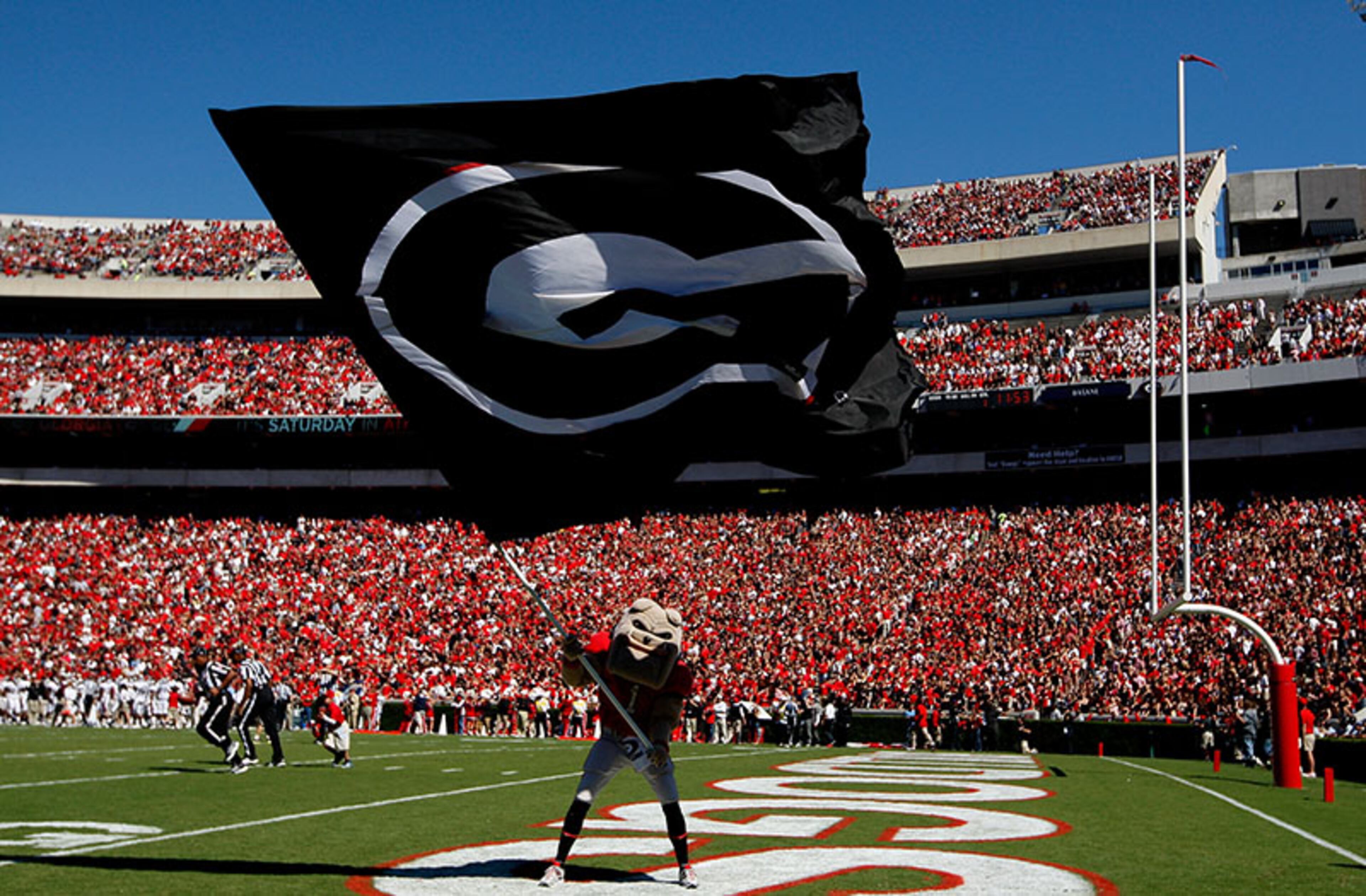 Hairy, mascot of the Georgia Bulldogs, waves a flag after a touchdown against the Mississippi State Bulldogs at Sanford Stadium on October 1, 2011, in Athens, Ga.