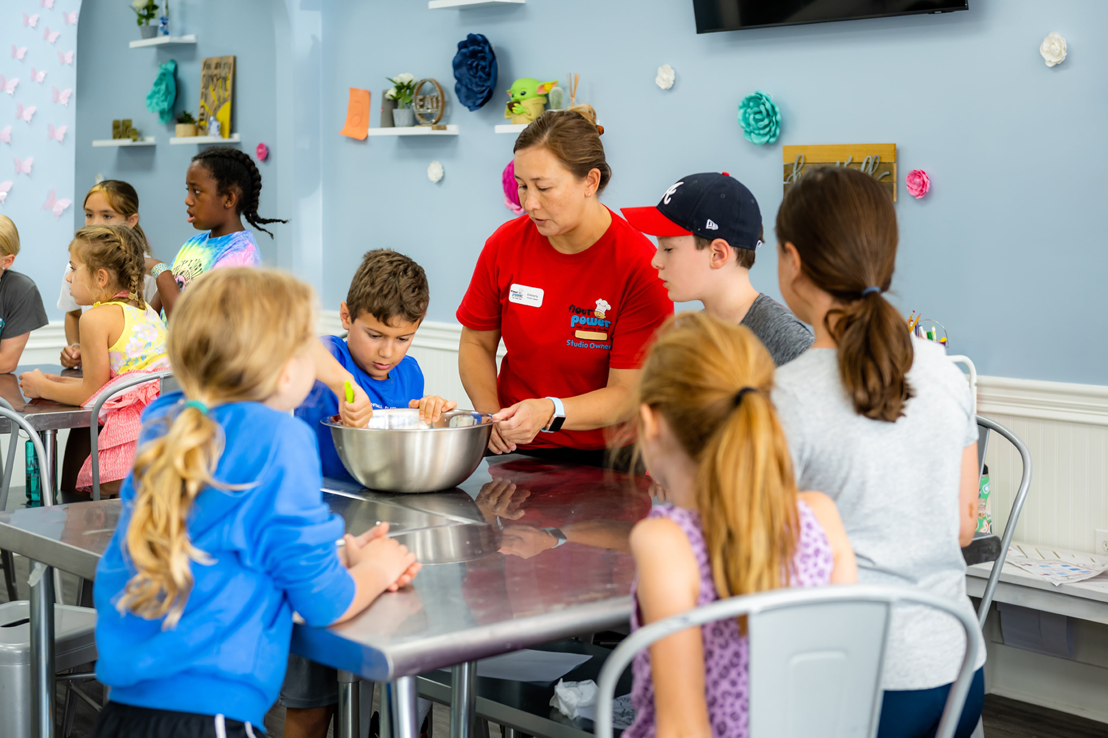 Children get hands-on cooking tips at the Flour Power Cooking Studios in Alpharetta.
Photo: Courtesy of Alpharetta Convention & Visitors Bureau / Lauren Hubbard