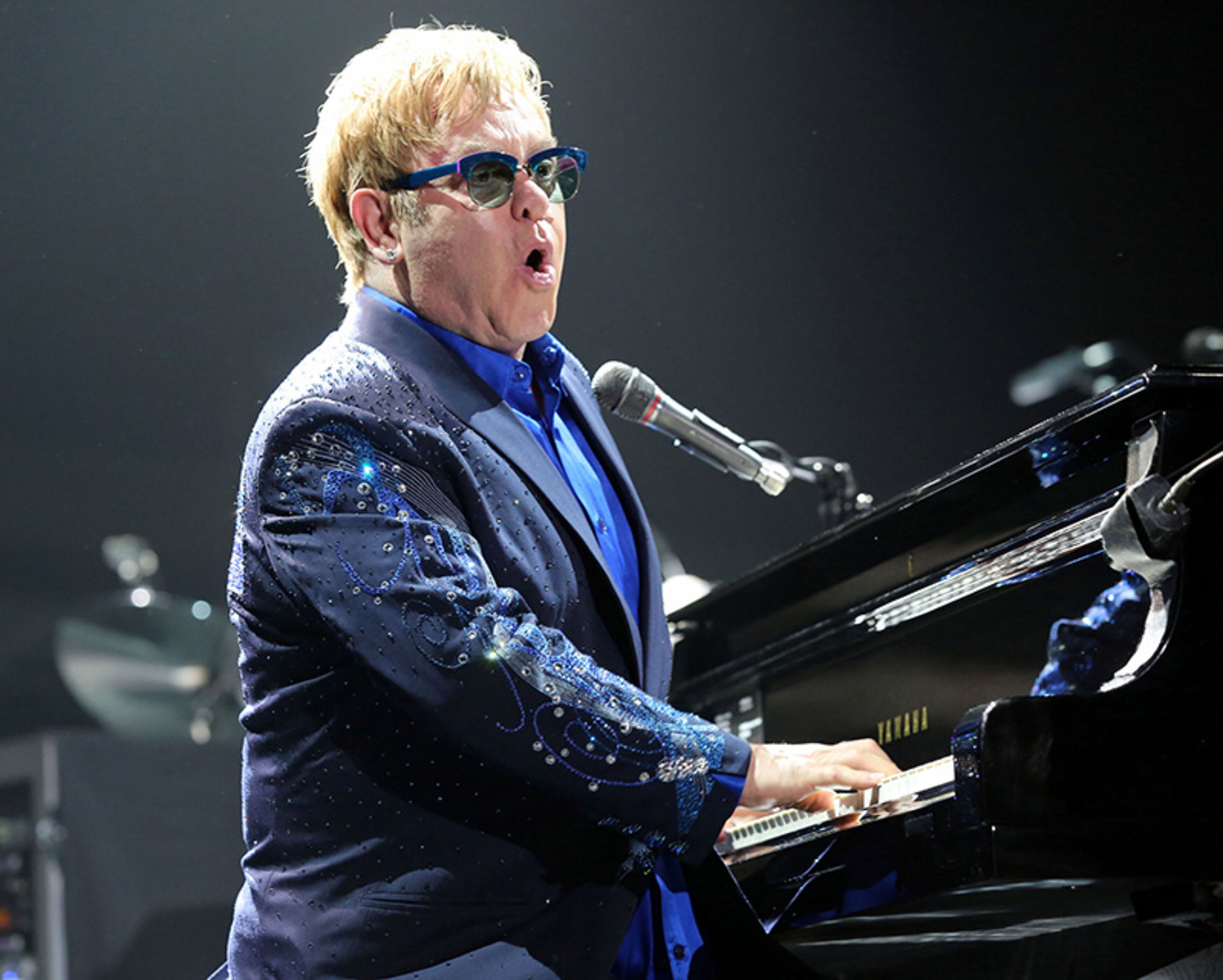 Elton John sings "Funeral for a Friend/Love Lies Bleeding."