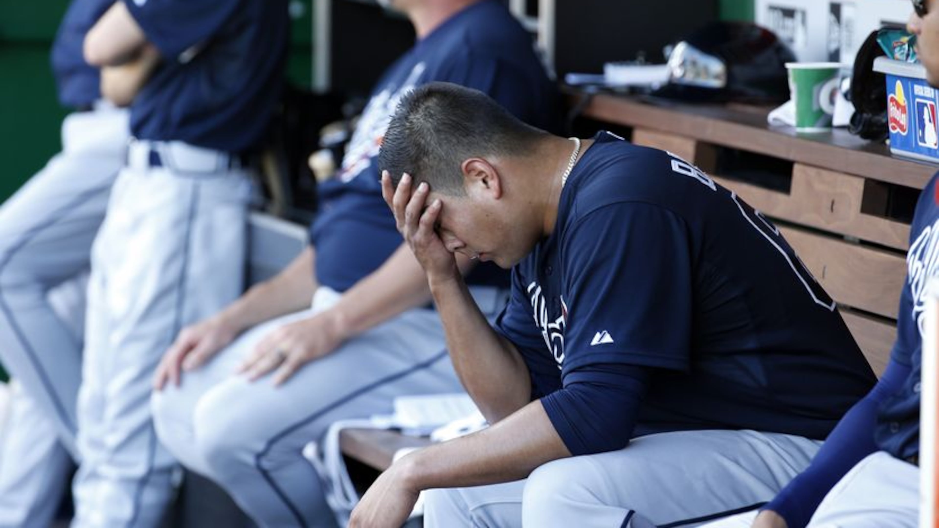 Manny Banuelos gave up seven runs (six earned) and recorded only six outs Sunday in the Braves' 12th consecutive loss. His expression after leaving the game captured the essence of the Braves' crumbling season. (AP photo)