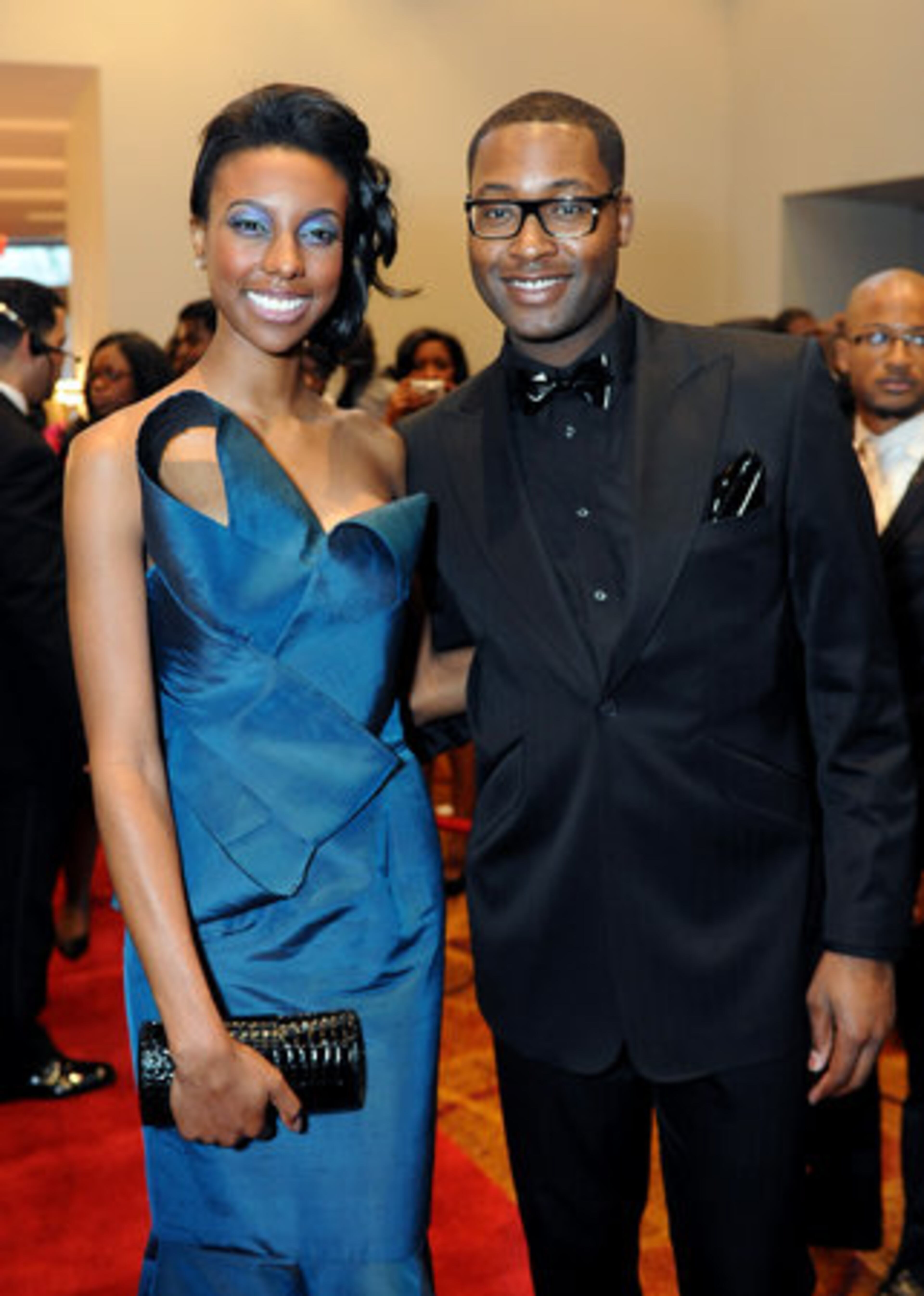 Michael Knight, fashion designer, and his model Daj on the red carpet.
