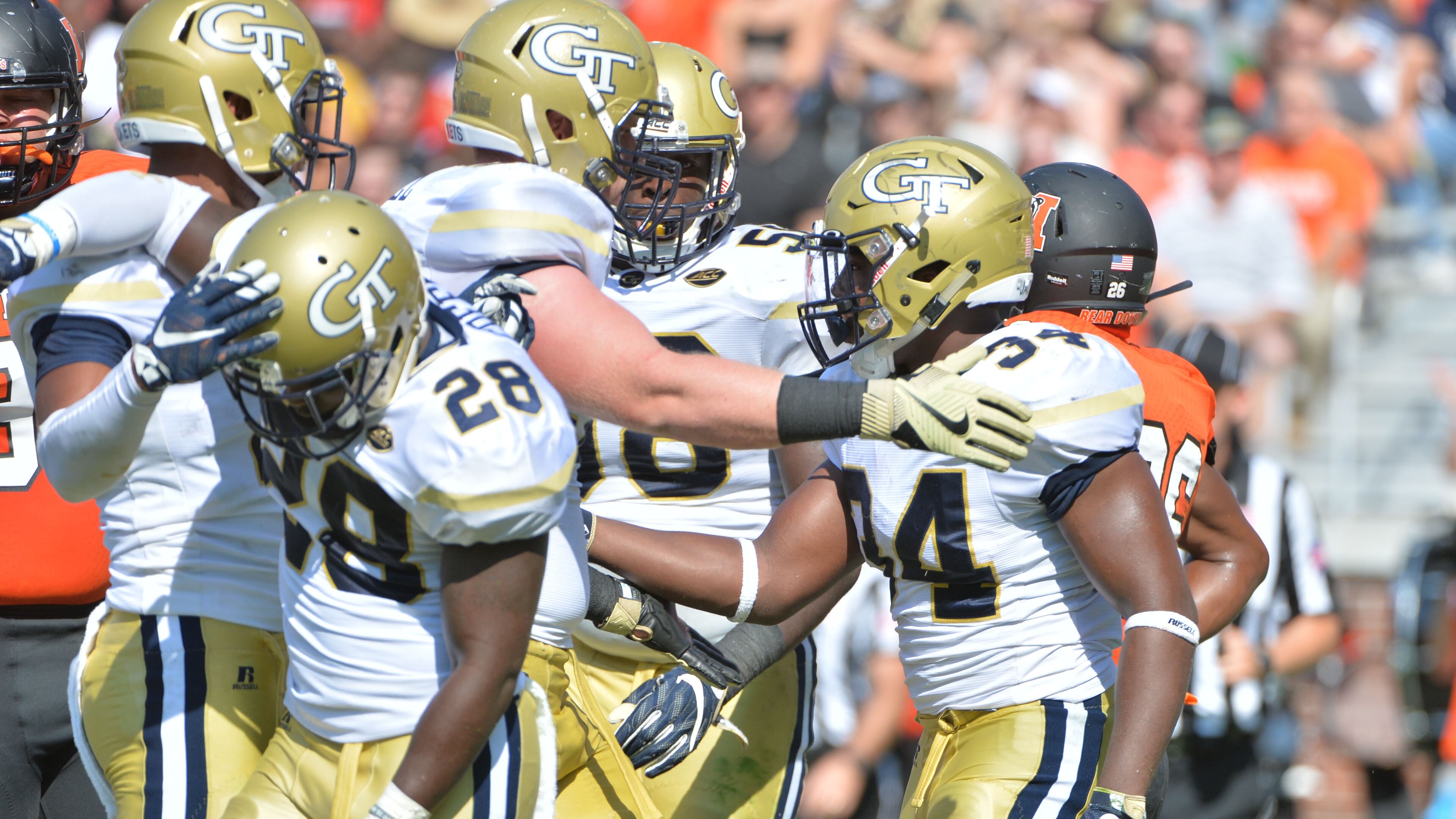 September 10, 2016 Atlanta - Georgia Tech Yellow Jackets running back Marcus Allen (24) is celebrated by teammates after he scored a touchdown in the first half at Bobby Dodd Stadium on Saturday, September 10, 2016. HYOSUB SHIN / HSHIN@AJC.COM