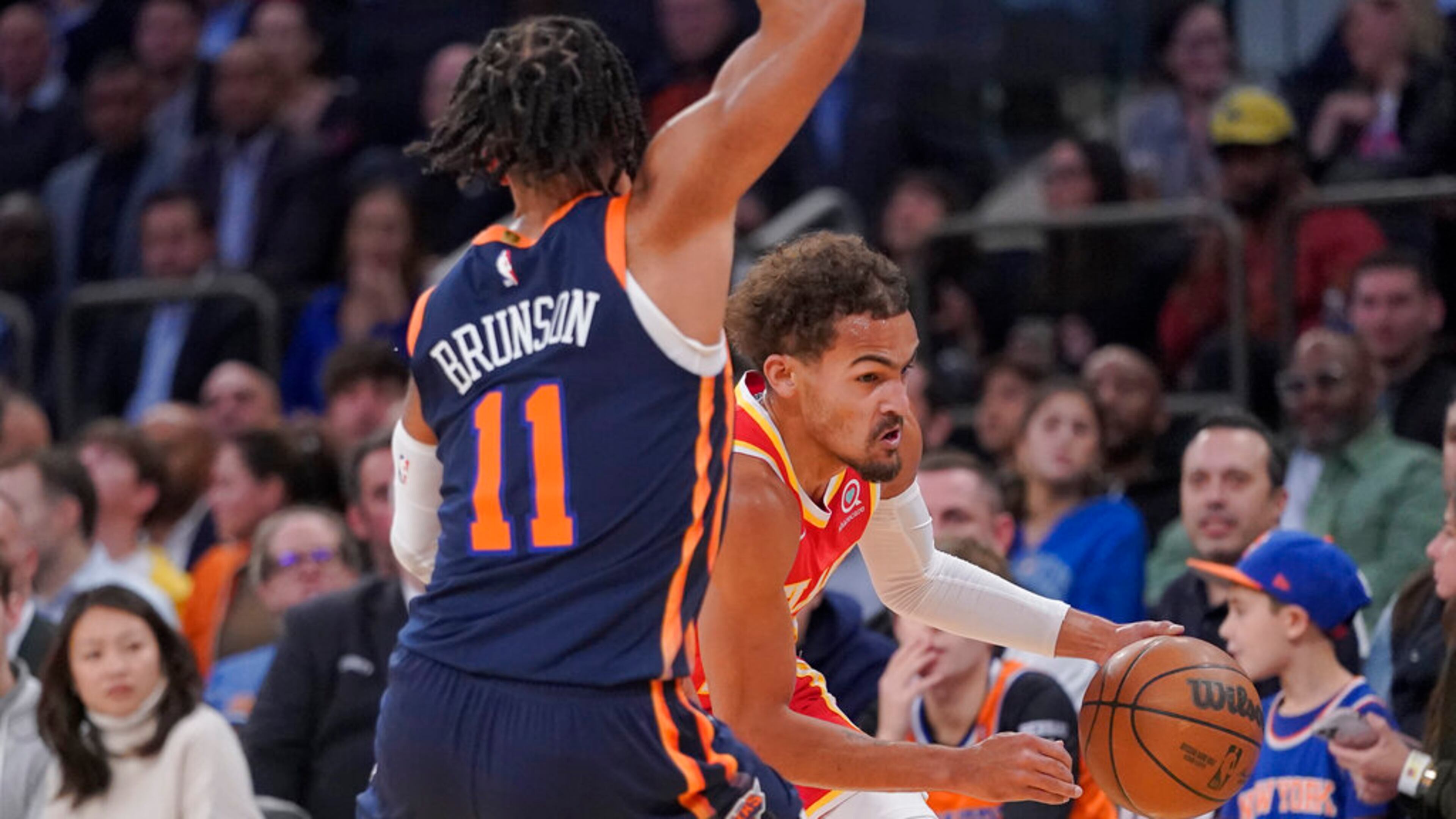 Atlanta Hawks guard Trae Young drives against New York Knicks guard Jalen Brunson (11) during the first half of an NBA basketball game Wednesday, Nov. 2, 2022, at Madison Square Garden in New York. (AP Photo/Mary Altaffer)