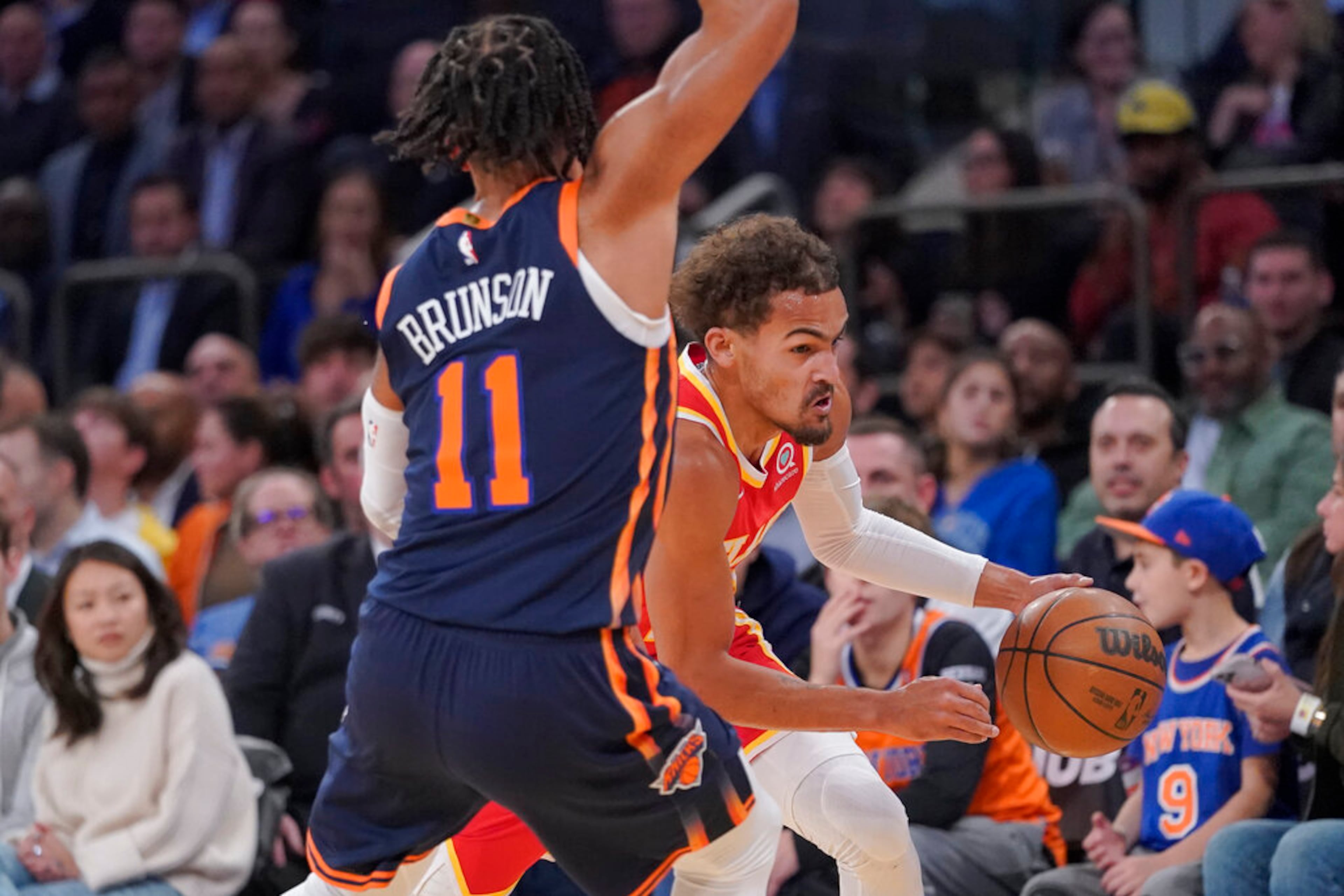 Atlanta Hawks guard Trae Young drives against New York Knicks guard Jalen Brunson (11) during the first half of an NBA basketball game Wednesday, Nov. 2, 2022, at Madison Square Garden in New York. (AP Photo/Mary Altaffer)