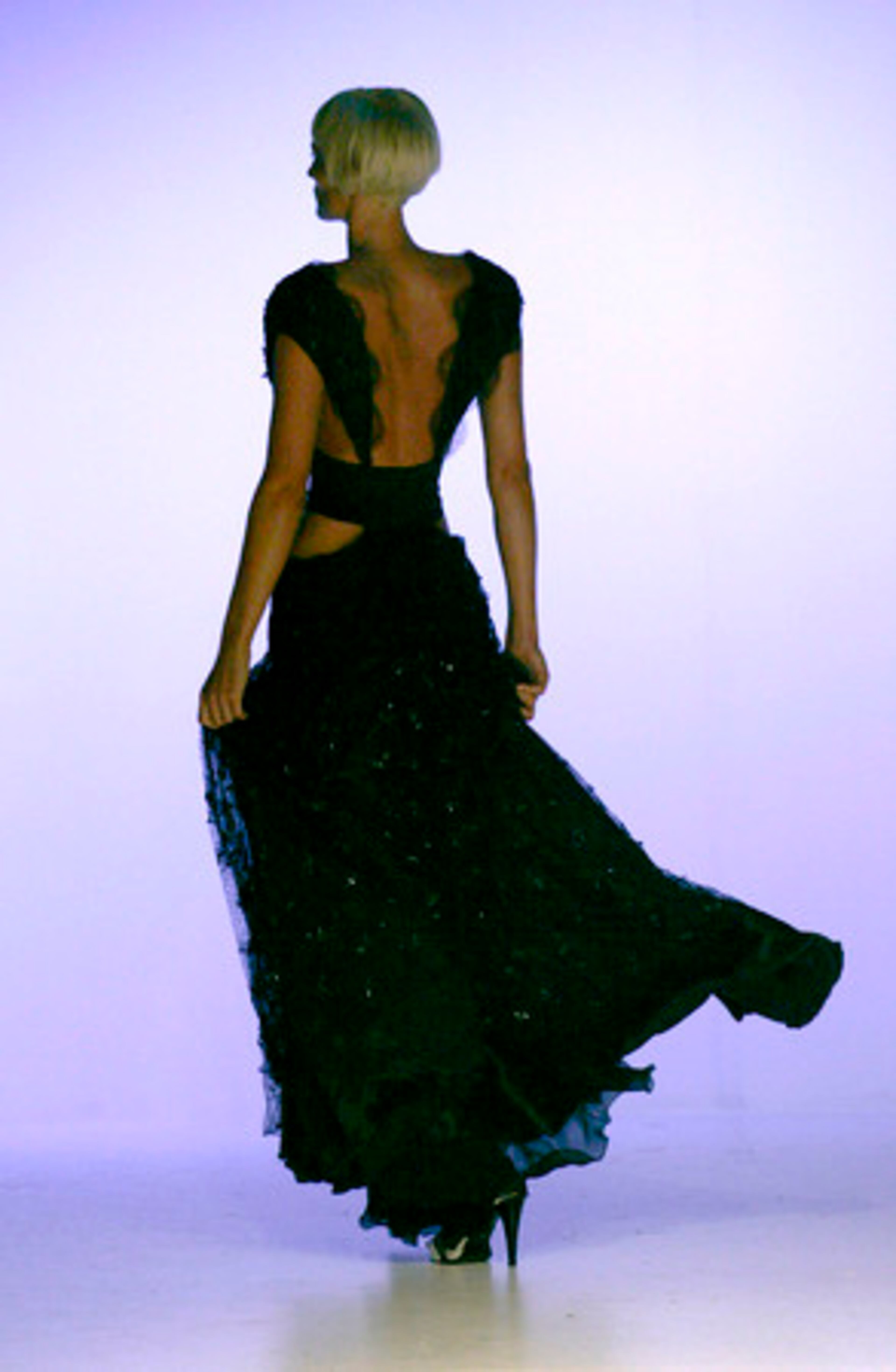 A model displays an outfit by Portuguese designer Fatima Lopes during the Portugal Fashion weekend Saturday in Vila Nova de Gaia, outside Porto.