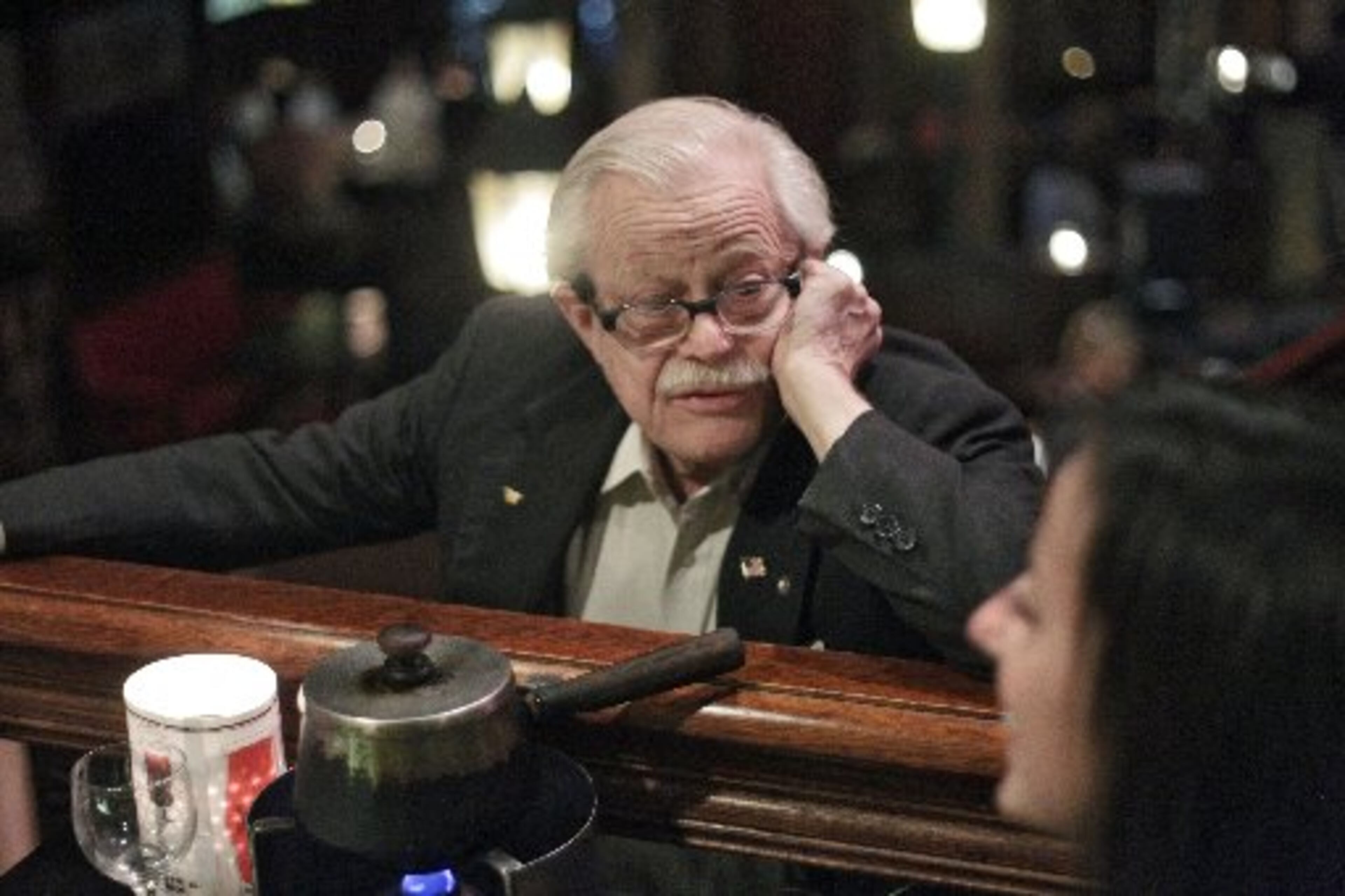 Dante Stephensen at the bar at his restaurant, which came down in 2013 to make way for new development. AJC File Photo