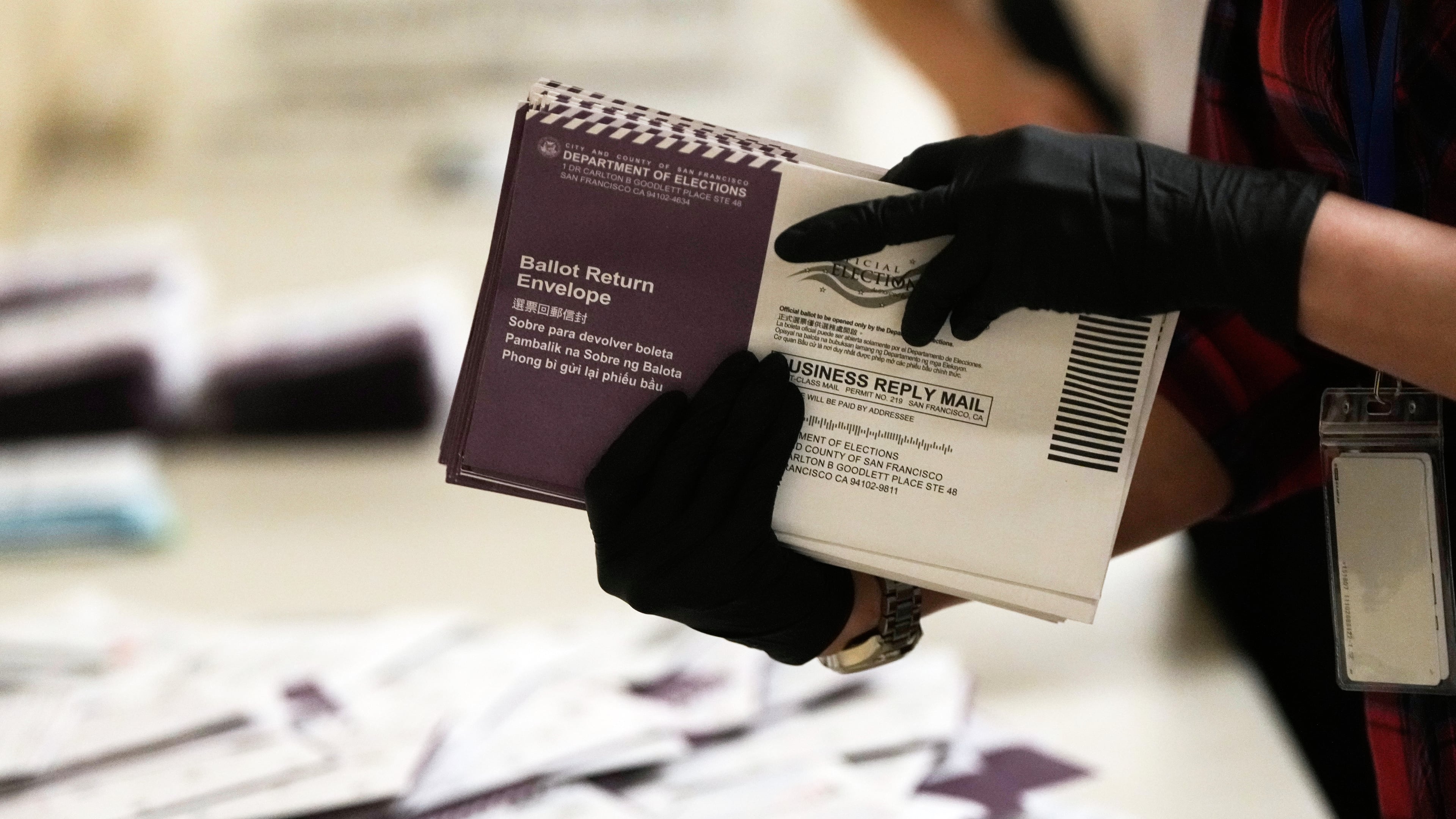 FILE - Department of Elections workers sort mail-in ballots for the California primary election at City Hall on Tuesday, June 2, 2026, in San Francisco. (AP Photo/Jeff Chiu, File)
