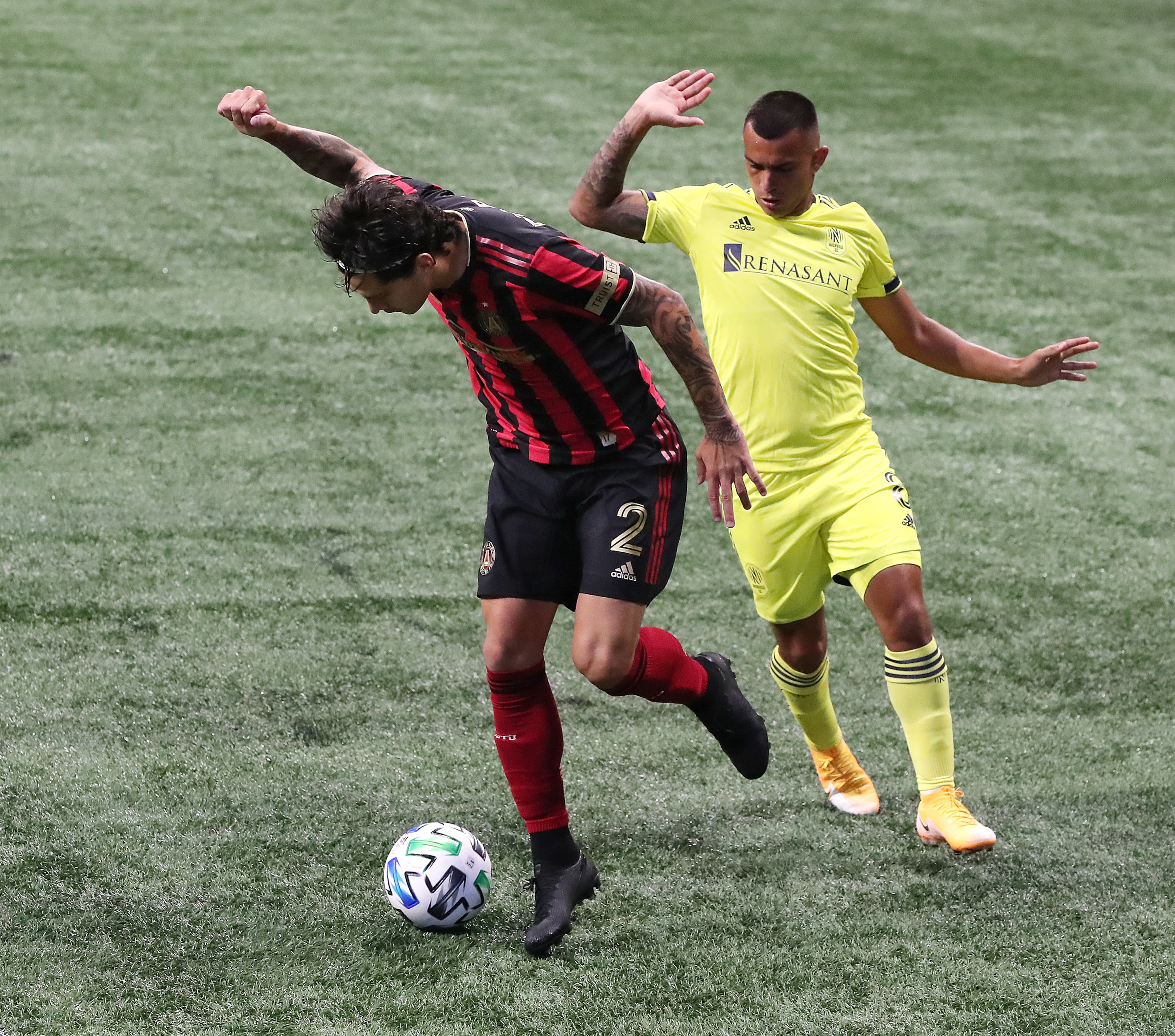 Atlanta United defender Franco Escobar battles Nashville SC forward Randall Leal for the ball in front of the Atlanta United net during the first half of their MLS soccer match on Saturday, August 22, 2020 in Atlanta. Curtis Compton ccompton@ajc.com