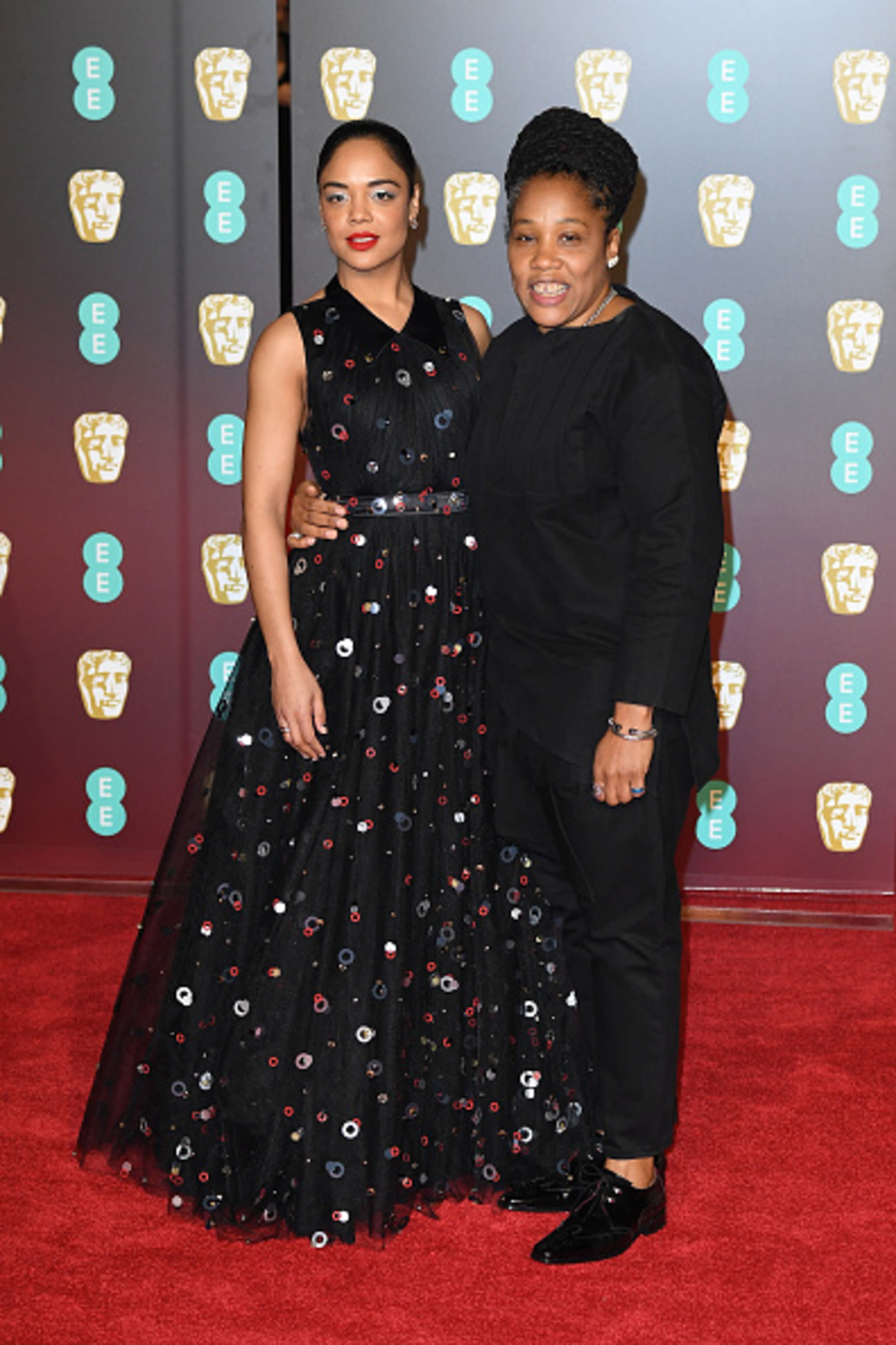 LONDON, ENGLAND - FEBRUARY 18: Tessa Thompson (L) and guest attend the EE British Academy Film Awards (BAFTA) held at Royal Albert Hall on February 18, 2018 in London, England. (Photo by Jeff Spicer/Jeff Spicer/Getty Images)
