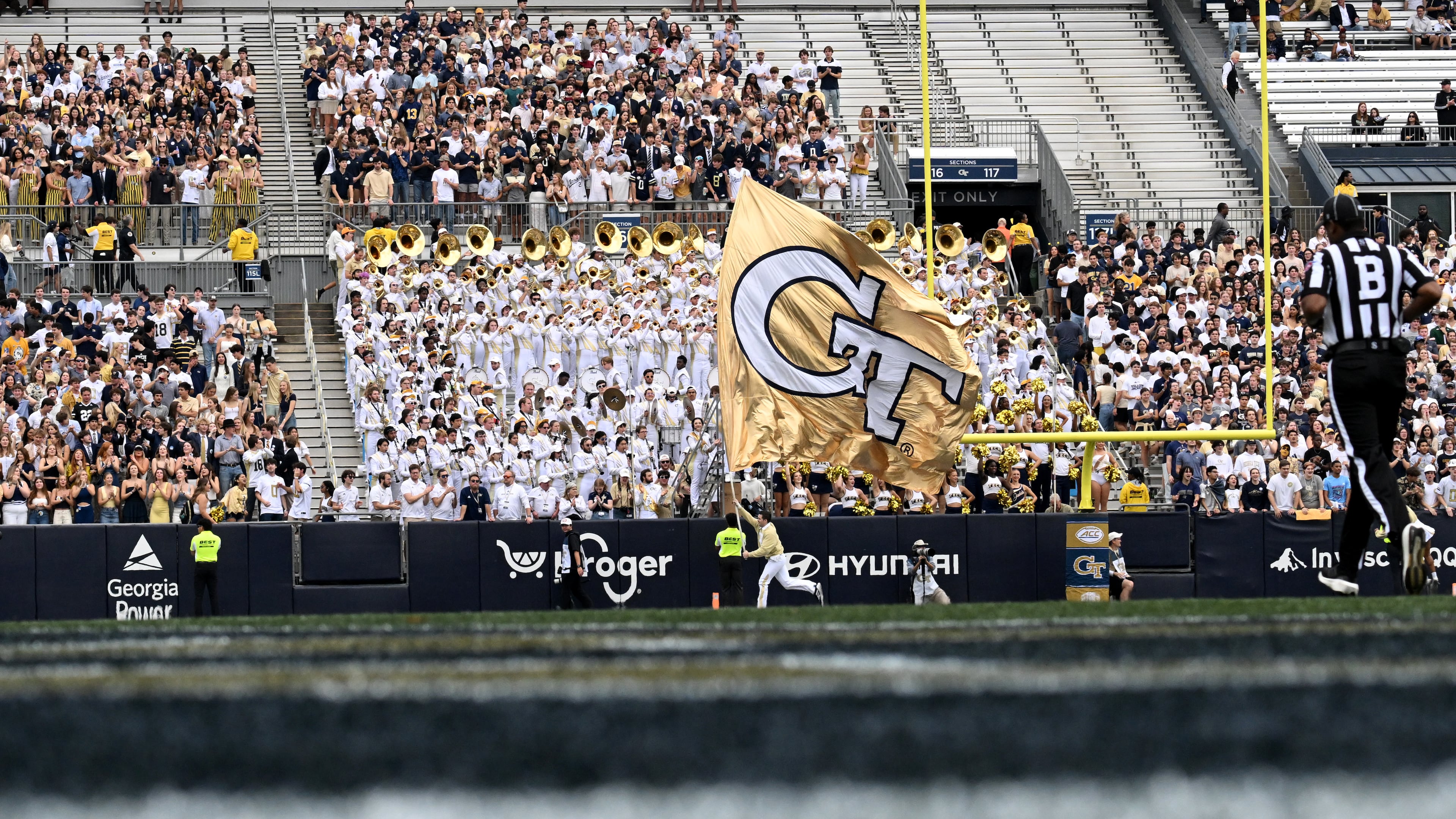 Fans react after scoring a touchdown during the first half of an NCAA college football game at Georgia Tech's Bobby Dodd Stadium, Saturday, Nov. 9, 2024, in Atlanta. Georgia Tech won 28-23 over Miami. (Photo by Hyosub Shin / The Atlanta Journal-Constitution)