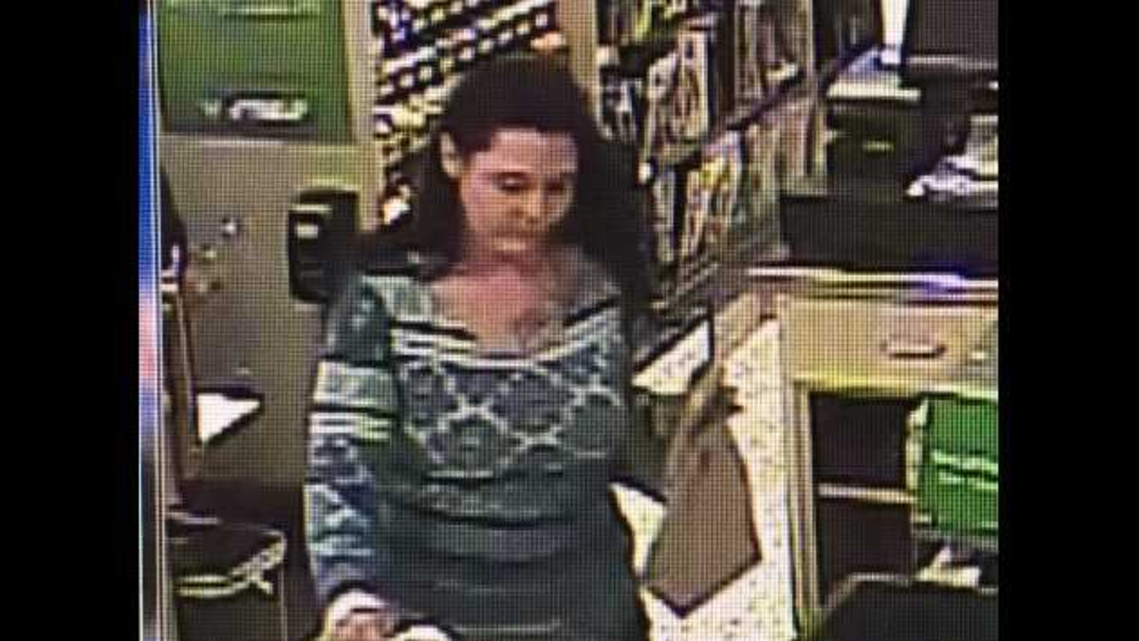 Police in Roswell are looking for this woman who they say stole a wallet and used the credit cards inside to buy gift cards and items at local stores.