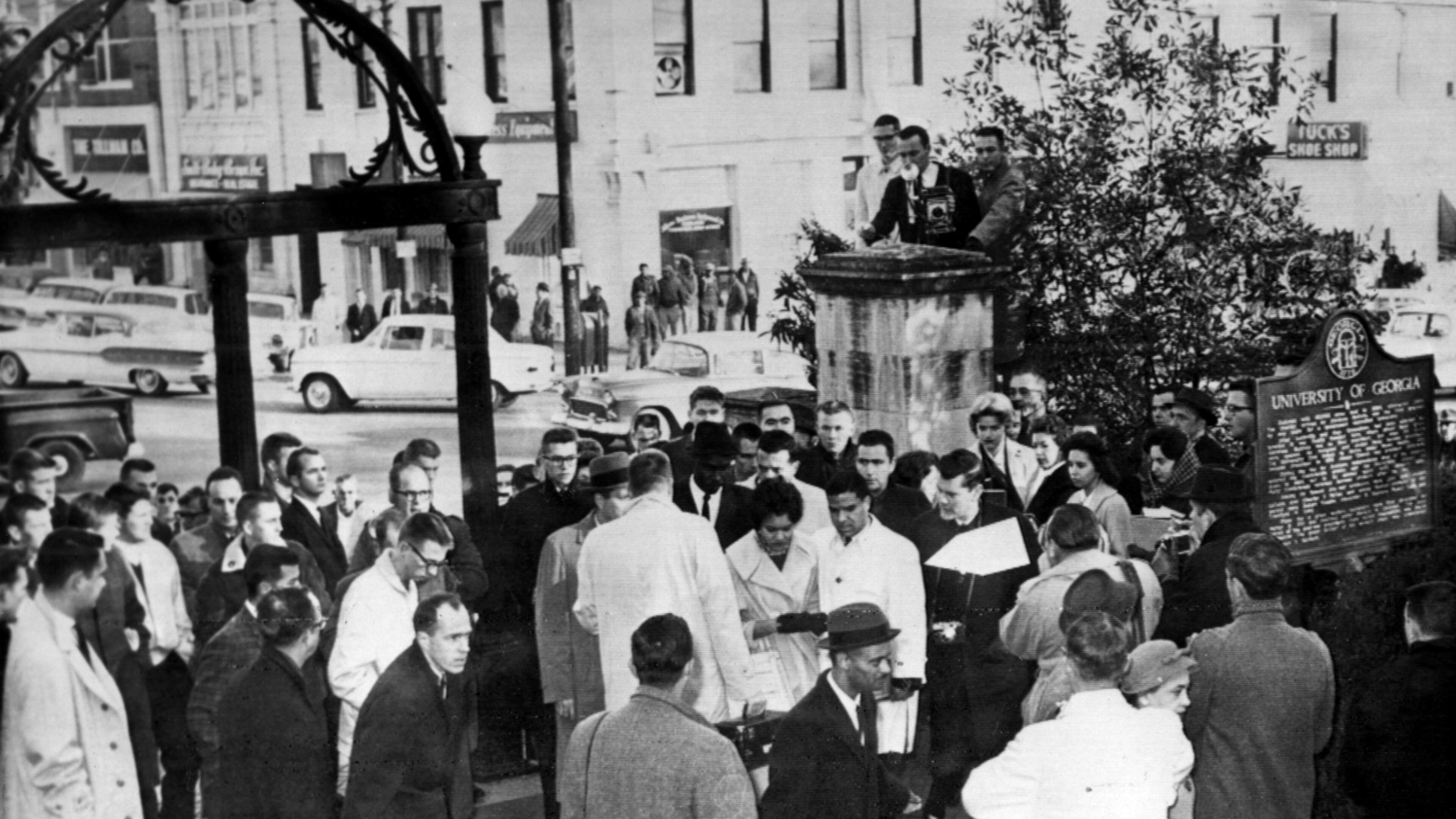 Rioting white students at UGA forced the first Black undergraduate students admitted, Charlayne Hunter and Hamilton Holmes, shown here arriving on the campus in 1961, to be removed from their dorms and taken out of Athens. When 340 UGA faculty members signed a petition calling for their return, a Board of Regents member demanded to see the list in order to punish them. (AJC file photo)
