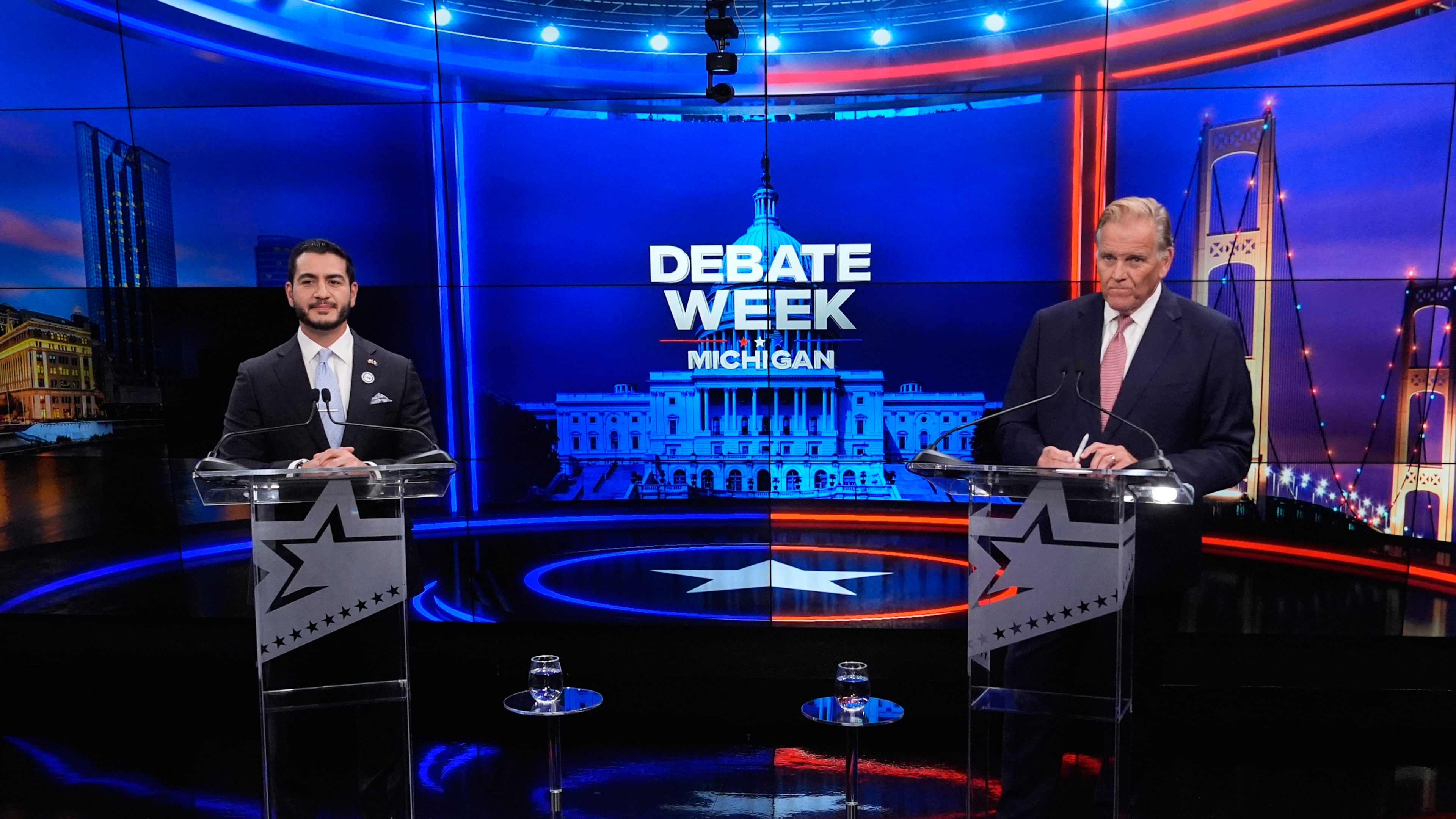 Democratic nominee for U.S. Senate Abdul El-Sayed, left, appears with Republican nominee for U.S. Senate Mike Rogers during a televised debate at WOOD-TV, on Thursday, Oct. 8, 2026, in Grand Rapids, Mich. (AP Photo/Paul Sancya, Pool)