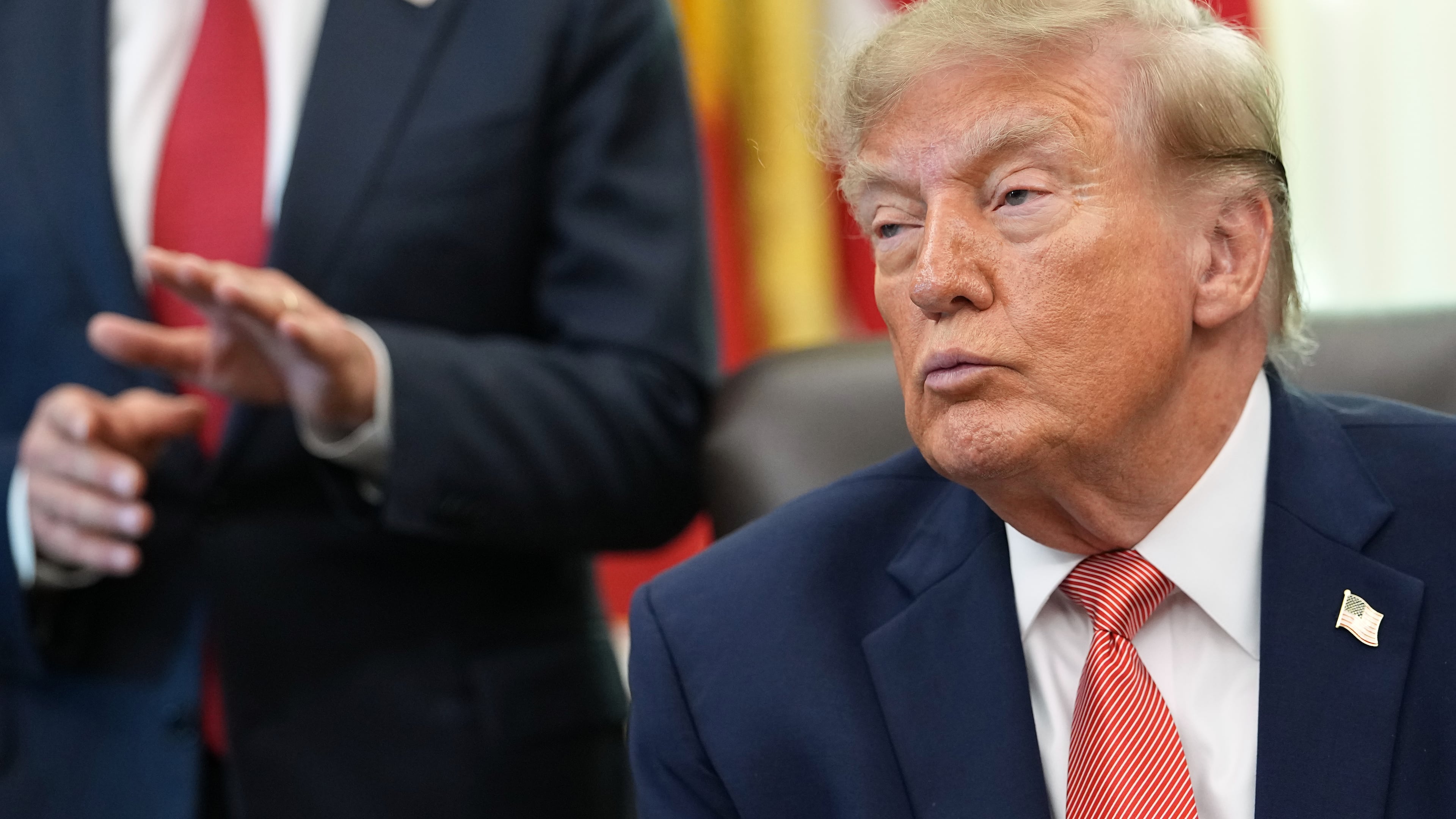 President Donald Trump listens as Centers for Medicare & Medicaid Services administrator Dr. Mehmet Oz speaks in the Oval Office of the White House, Tuesday, Oct. 20, 2026, in Washington. (AP Photo/Jacquelyn Martin)