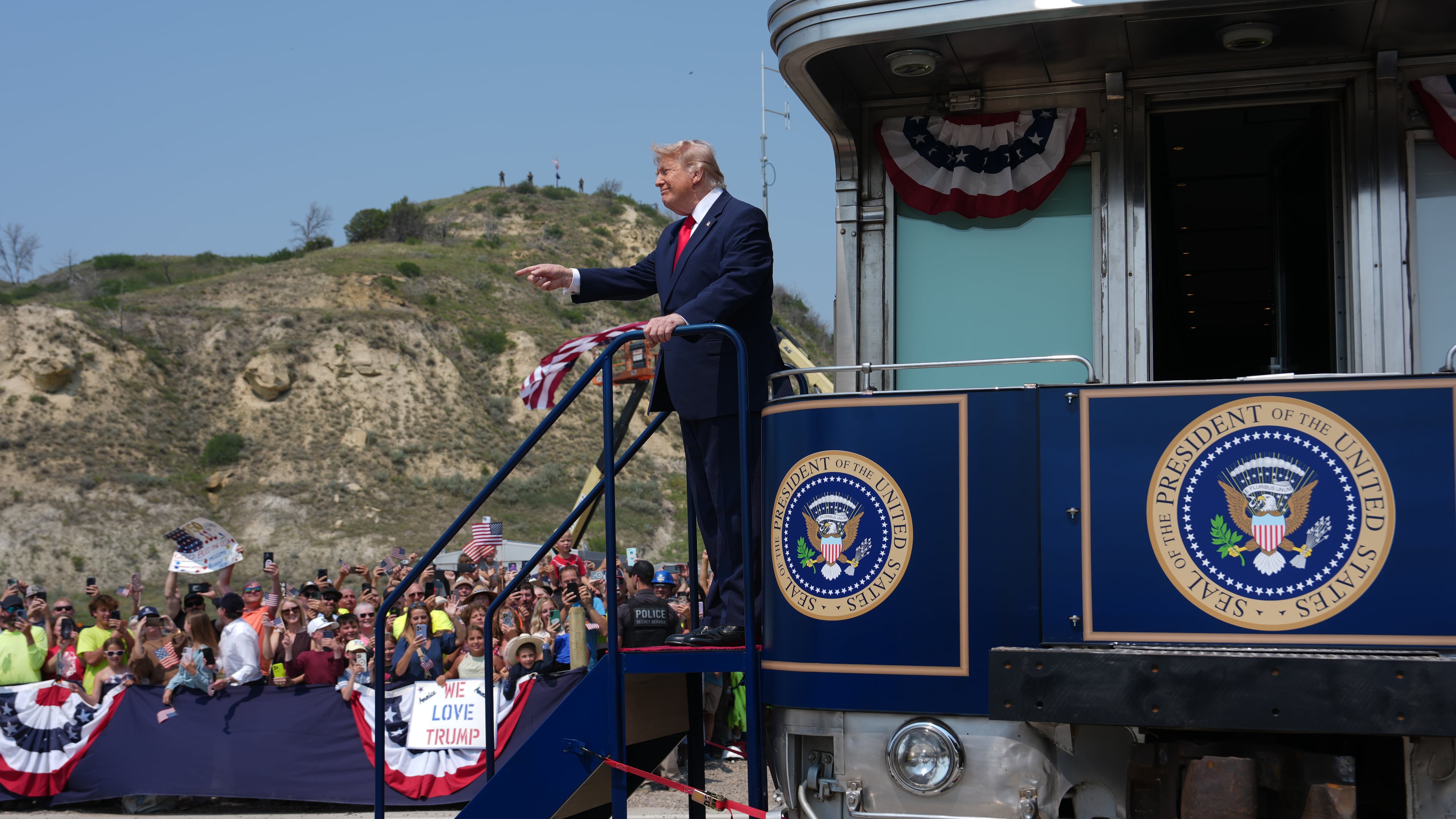 President Donald Trump arrives on the Freedom 250 train, Wednesday, July 1, 2026, in Medora, N.D., for the opening of the Theodore Roosevelt President Library. (AP Photo/Julia Demaree Nikhinson)