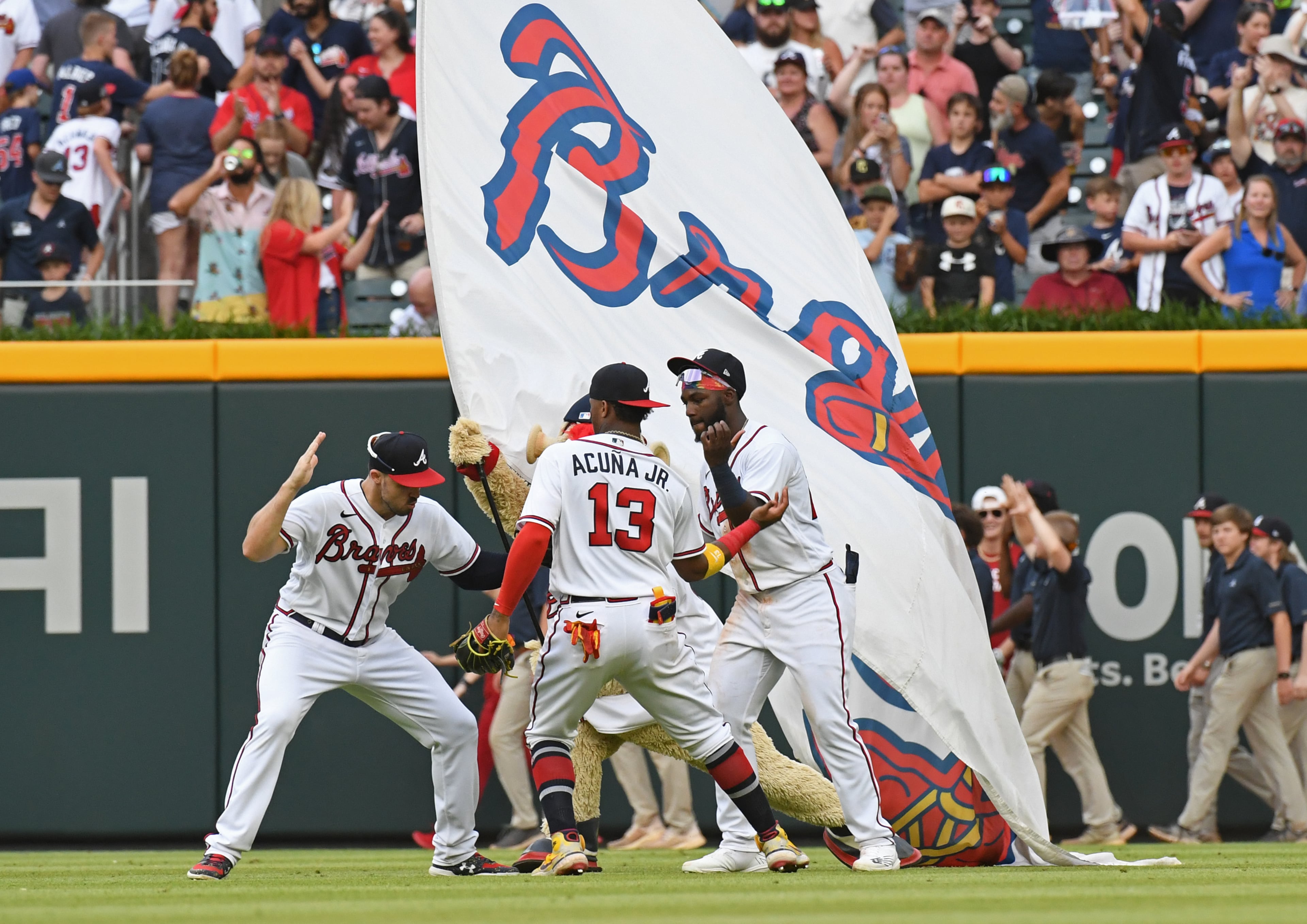 Another win for the Braves: Braves outfielders celebrate after Saturday's 10-4 victory over the Pirates at Truist Park. The win was the 10th straight for the Braves, who have yet to lose in the month of June. (Hyosub Shin/hshin@ajc.com)
