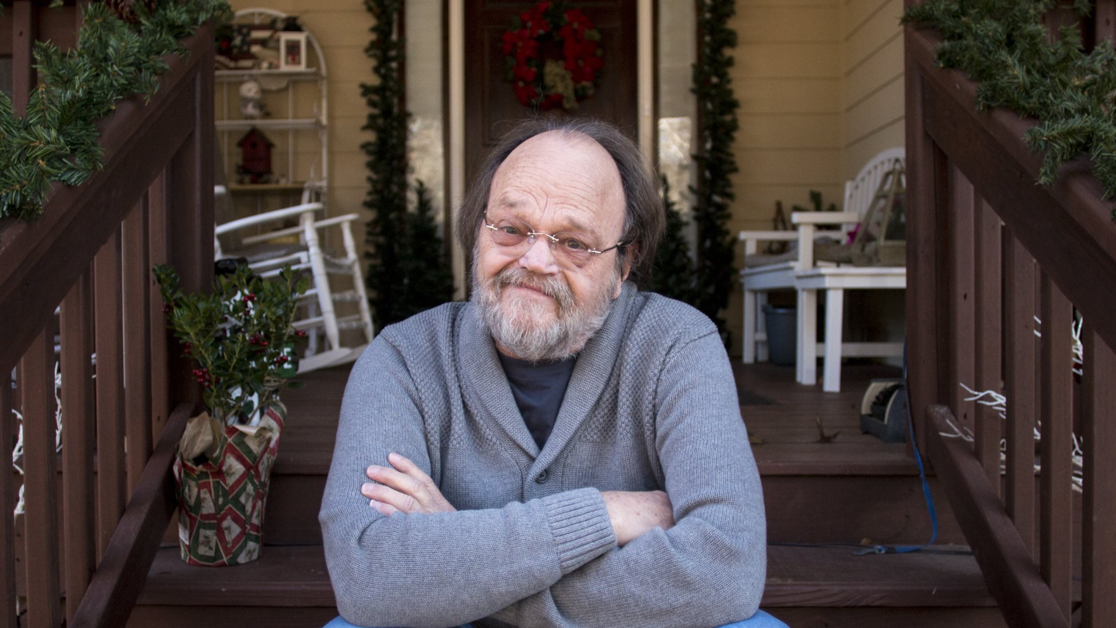 William Tokarsky, 69, poses for a portrait at his home in Newnan. With his retirement pension from General Motors, Social Security checks and extra income from acting, Tokarsky is comfortable. The new tax bill, he says, “is going to stifle a lot of struggling actors” — actors who, unlike him, don’t have one career under their belt already. “It can be lucrative, but the odds of you making it are so astronomical,” Tokarsky says. CASEY.SYKES / AJC