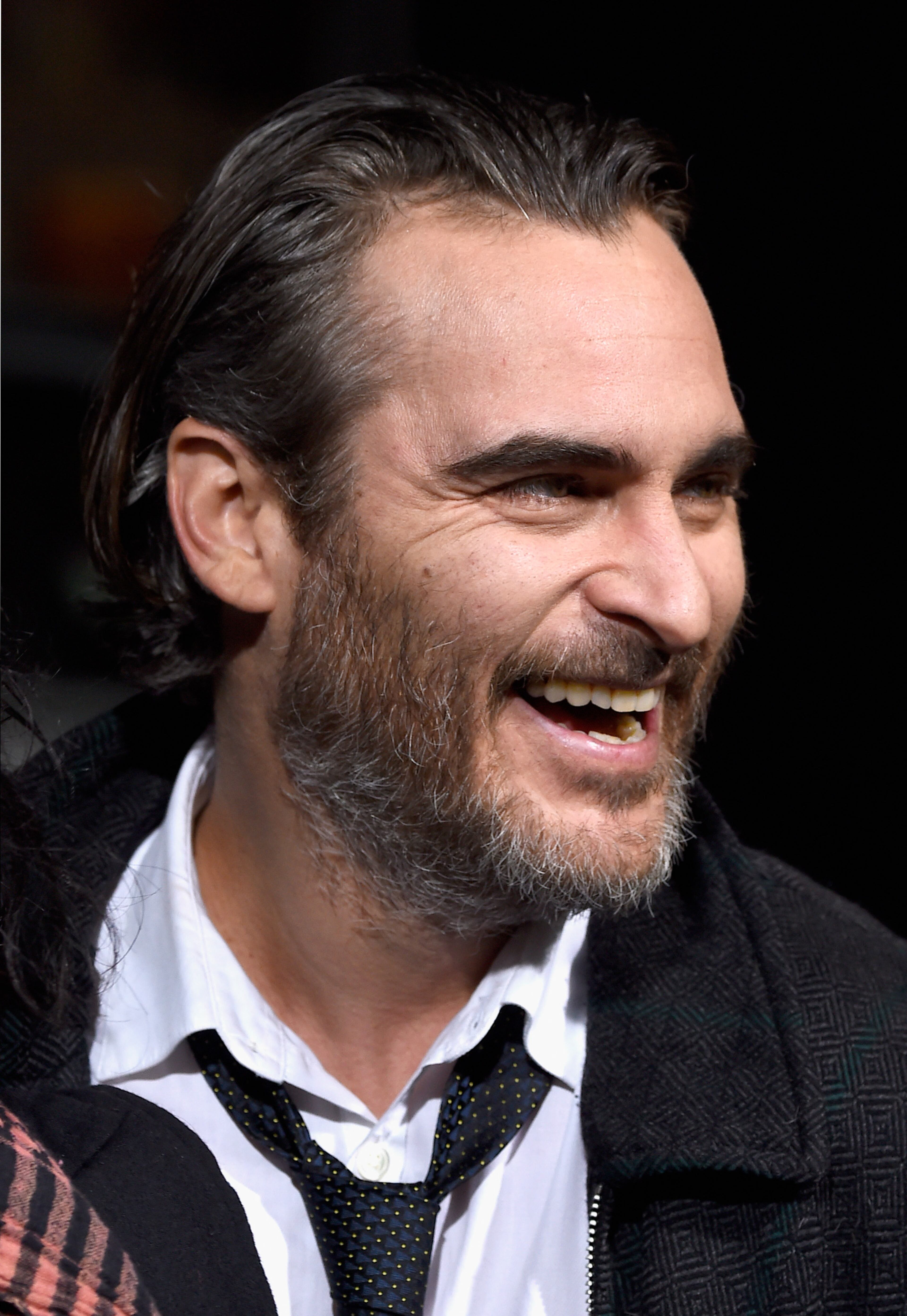 HOLLYWOOD, CA - DECEMBER 10: Actor Joaquin Phoenix attends the Premiere Of Warner Bros. Pictures' "Inherent Vice" at TCL Chinese Theatre on December 10, 2014 in Hollywood, California. (Photo by Frazer Harrison/Getty Images)