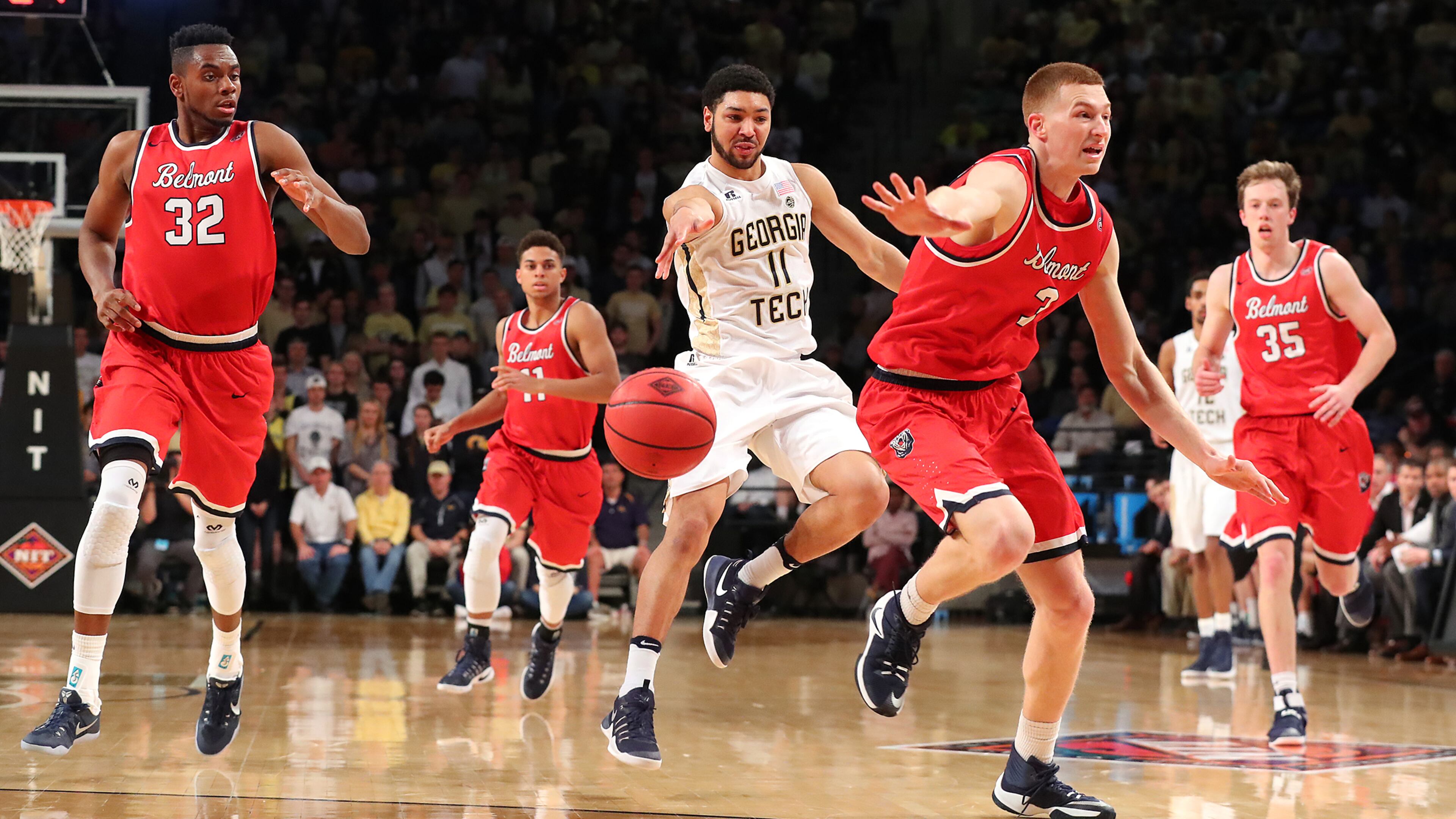 March 19, 2017, Atlanta: Georgia Tech guard Josh Heath passes it off on a fast break against four Belmont defenders in their NIT tournament round two NCAA basketball game on Sunday, March 19, 2017, in Atlanta. Curtis Compton/ccompton@ajc.com