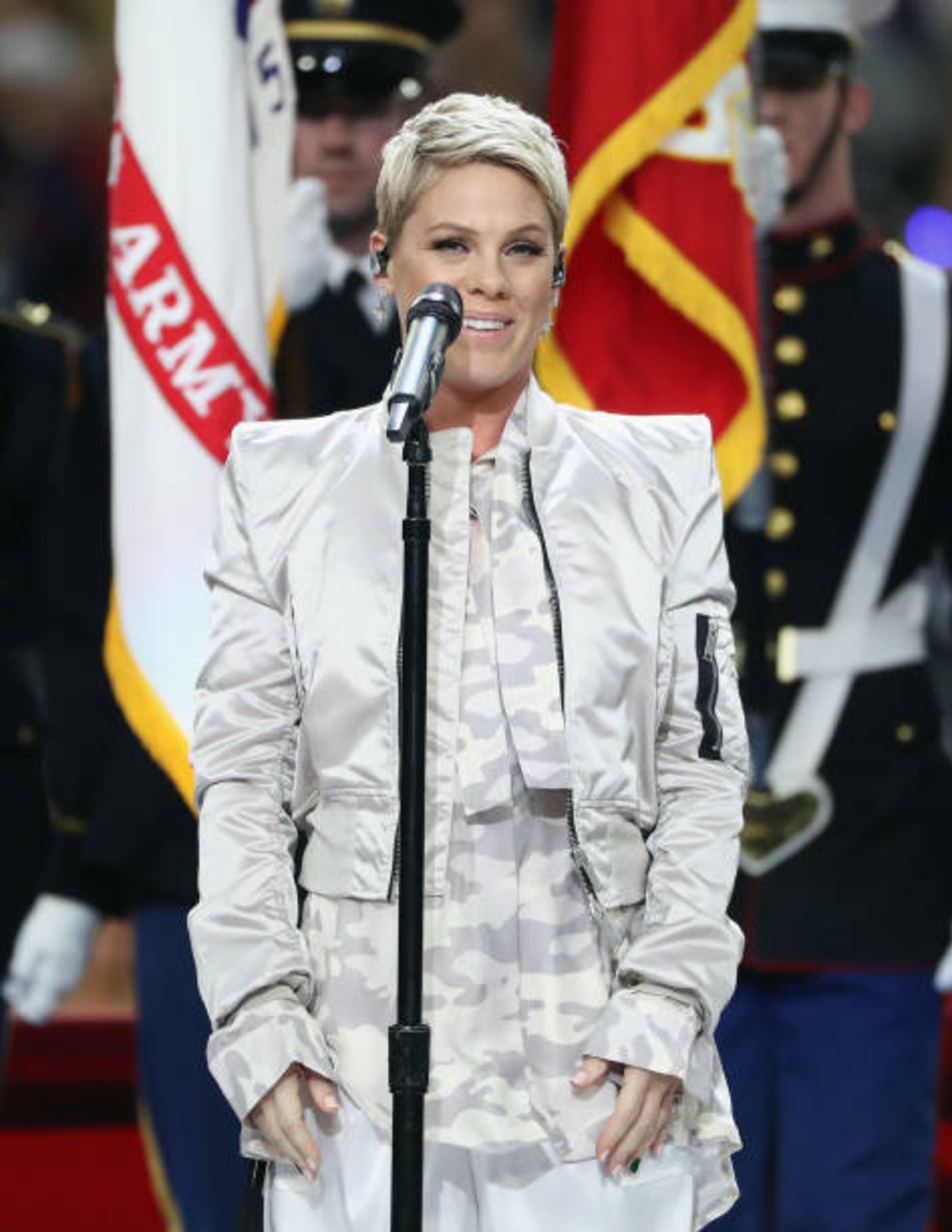 MINNEAPOLIS, MN - FEBRUARY 04: Pink sings the national anthem prior to Super Bowl LII between the New England Patriots and the Philadelphia Eagles at U.S. Bank Stadium on February 4, 2018 in Minneapolis, Minnesota. (Photo by Elsa/Getty Images)