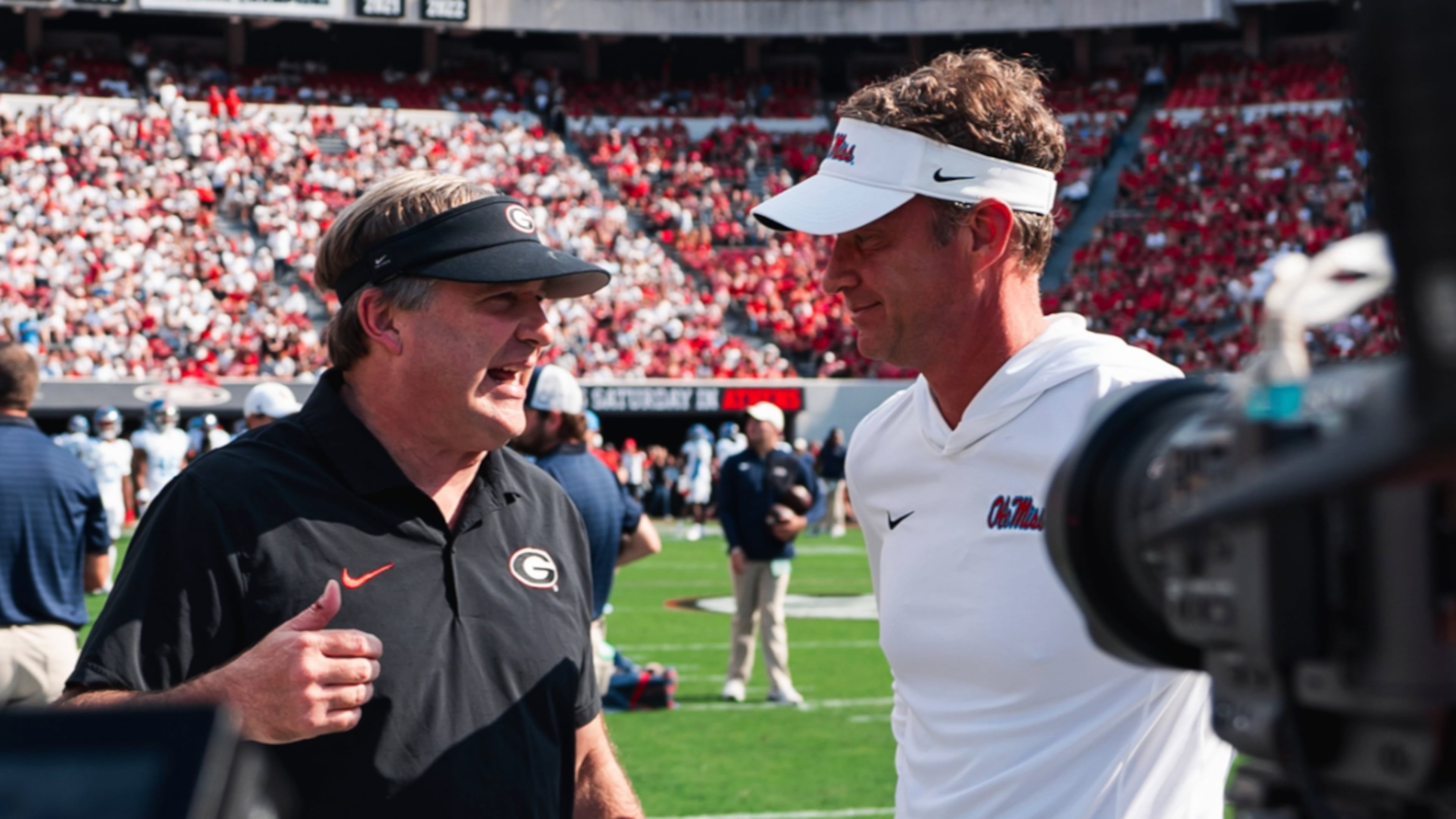 Kirby Smart said it's up to each program how they handle the possibility of adding NFL players from the 2022 class to their roster, but Missouri coach Eli Drinkwitz believes what's happening right now is a 'clown show' that reflects poor leadership.
