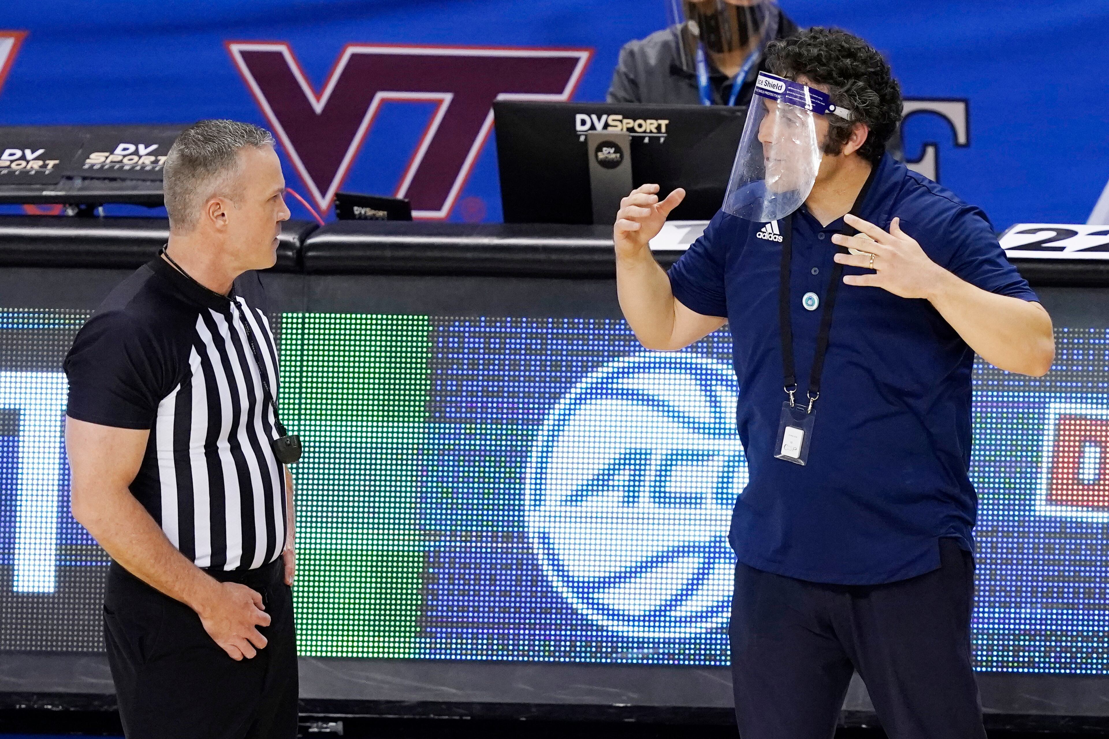 Georgia Tech coach Josh Pastner talks with an official during the first half of Saturday's game.