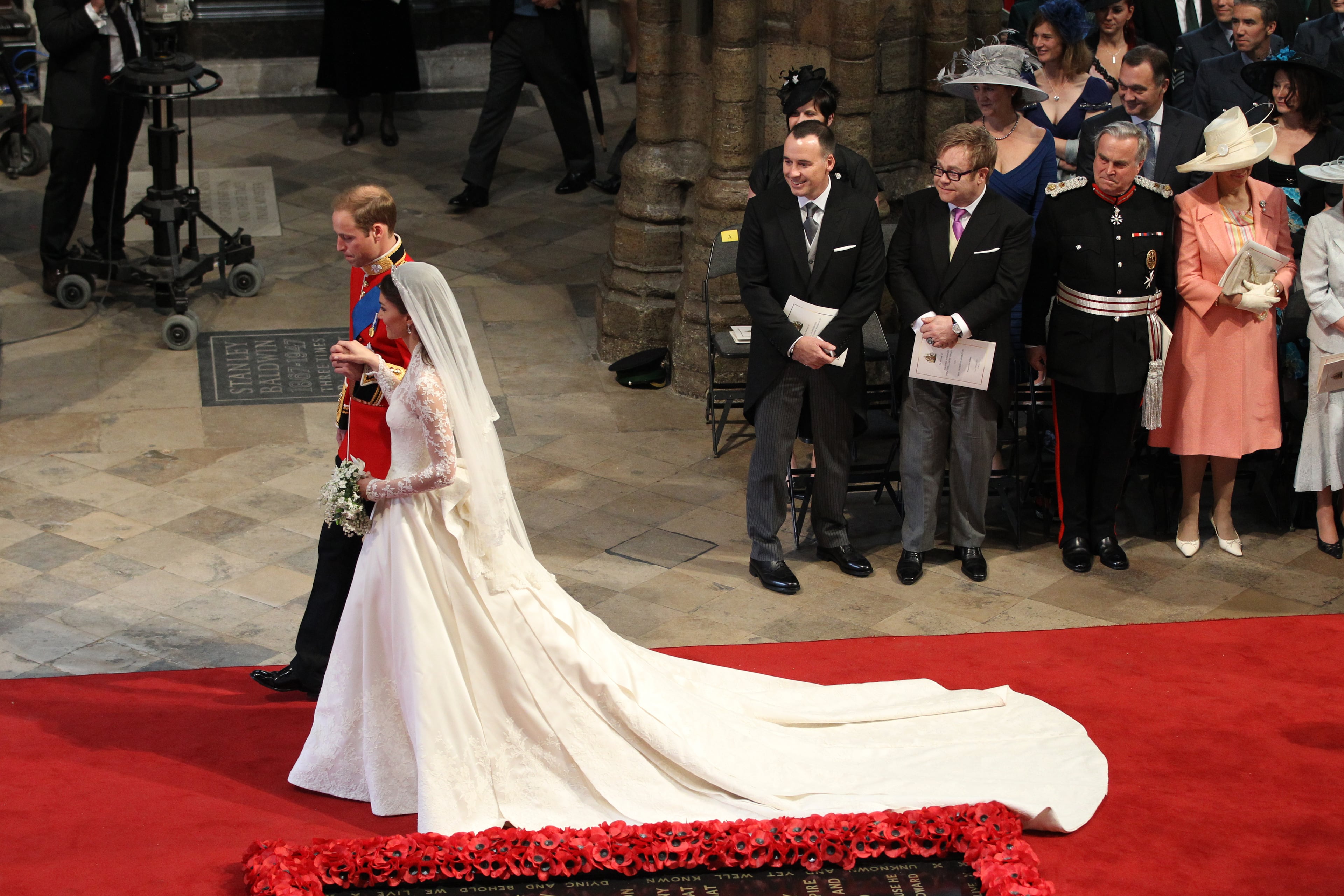 LONDON, ENGLAND - APRIL 29: Prince William, Duke of Cambridge and Catherine, Duchess of Cambridge leave Westminster Abbey following their marriage ceremony, on April 29, 2011 in London, England. The marriage of Prince William, the second in line to the British throne, to Catherine Middleton is being held in London today. The Archbishop of Canterbury conducted the service which was attended by 1900 guests, including foreign Royal family members and heads of state. Thousands of well-wishers from around the world have also flocked to London to witness the spectacle and pageantry of the Royal Wedding and street parties are being held throughout the UK. (Photo by Adrian Dennis-WPA Pool/Getty Images)