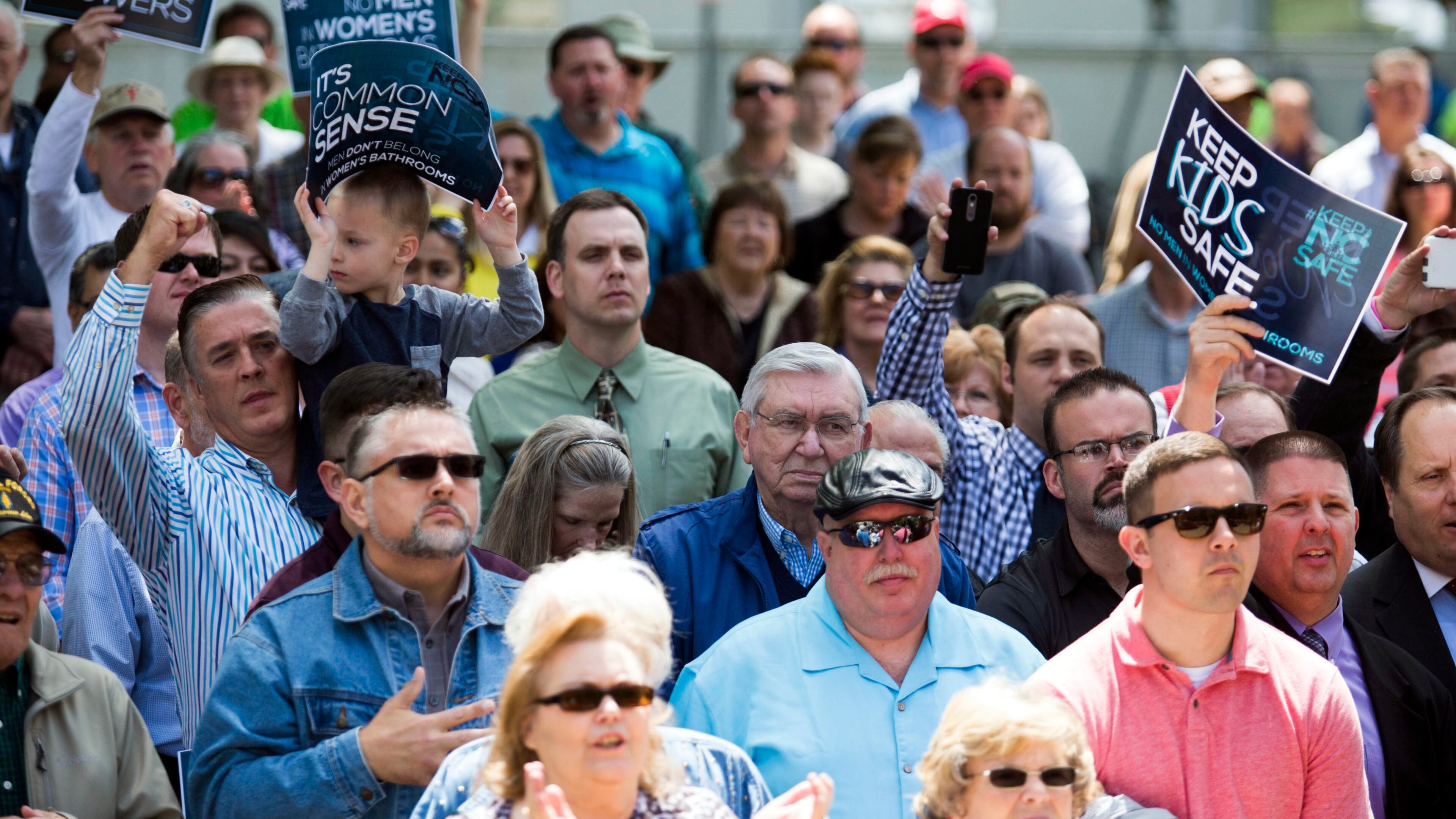 Proponents of a new state law that restricts transgender bathroom use and pre-empts local governments from creating their own anti-discrimination policies, at a rally outside the the North Carolina State Capitol in Raleigh, April 11. (Ray Whitehouse / The New York Times)
