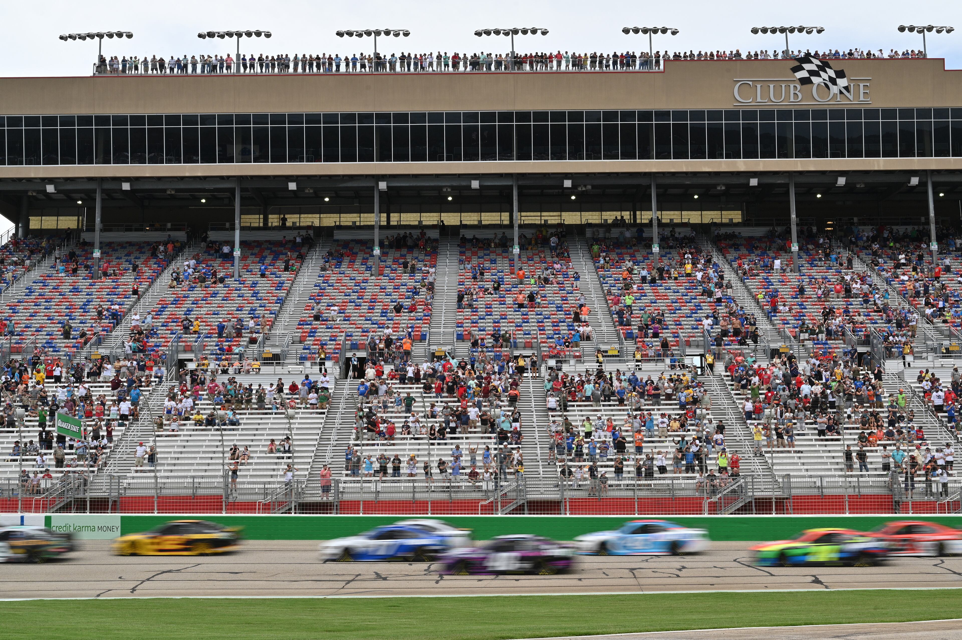 NASCAR fans watch during the Quaker State 400 presented by Walmart Sunday, July 11, 2021, at Atlanta Motor Speedway in Hampton. (Hyosub Shin / Hyosub.Shin@ajc.com)