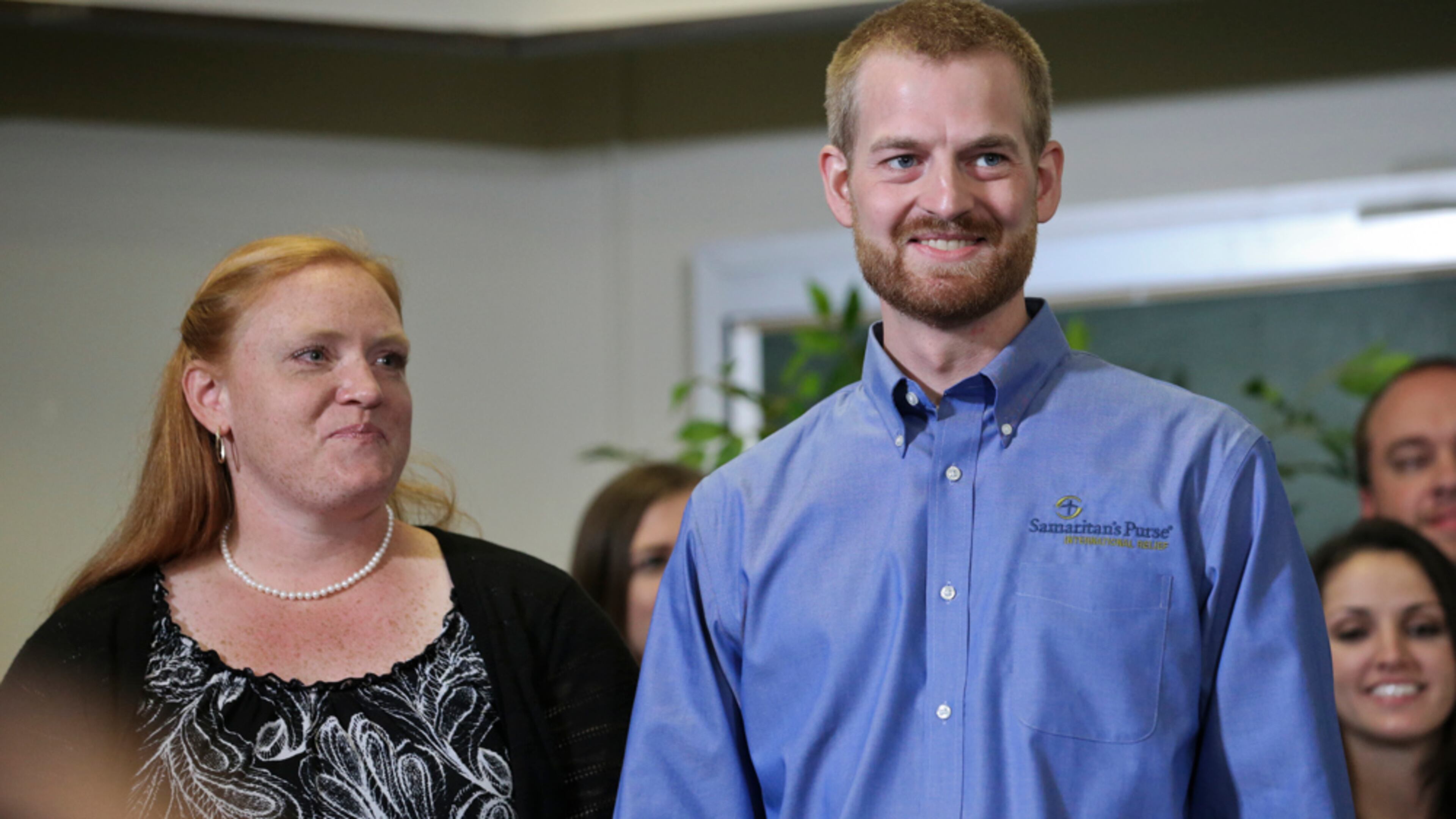 EBOLA VICTIM GOES HOME--August 21, 2014 Dekalb County: Dr. Kent Brantly stood with his wife Amber and made a statement at Emory University Hospital annex following his discharge from the facility after being successfully treated for Ebola Thursday, Aug. 21, 2014. Bruce Ribner, MD, medical director of Emory's Infectious Disease Unit, discussed the discharge of Brantly and the discharge of patient, missionary Nancy Writebol, who also had contracted the Ebola virus. JOHN SPINK/JSPINK@AJC.COM