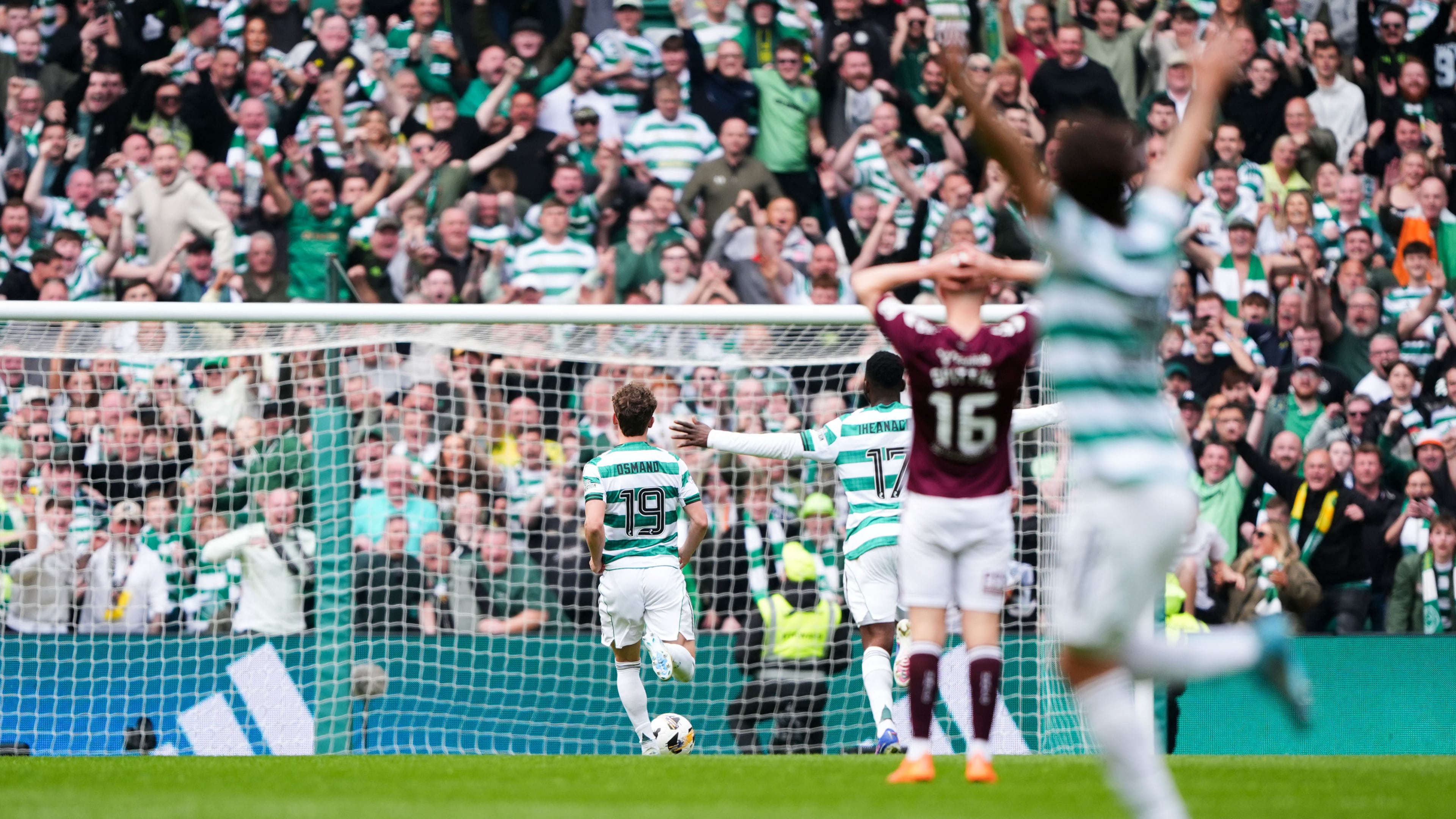 Celtic's Callum Osmand runs clean through to score his side's third goal during the Premiership soccer match between Celtic and Heart of Midlothian, in Glasgow, Scotland, Saturday May 16, 2026. (Andrew Milligan/PA via AP)