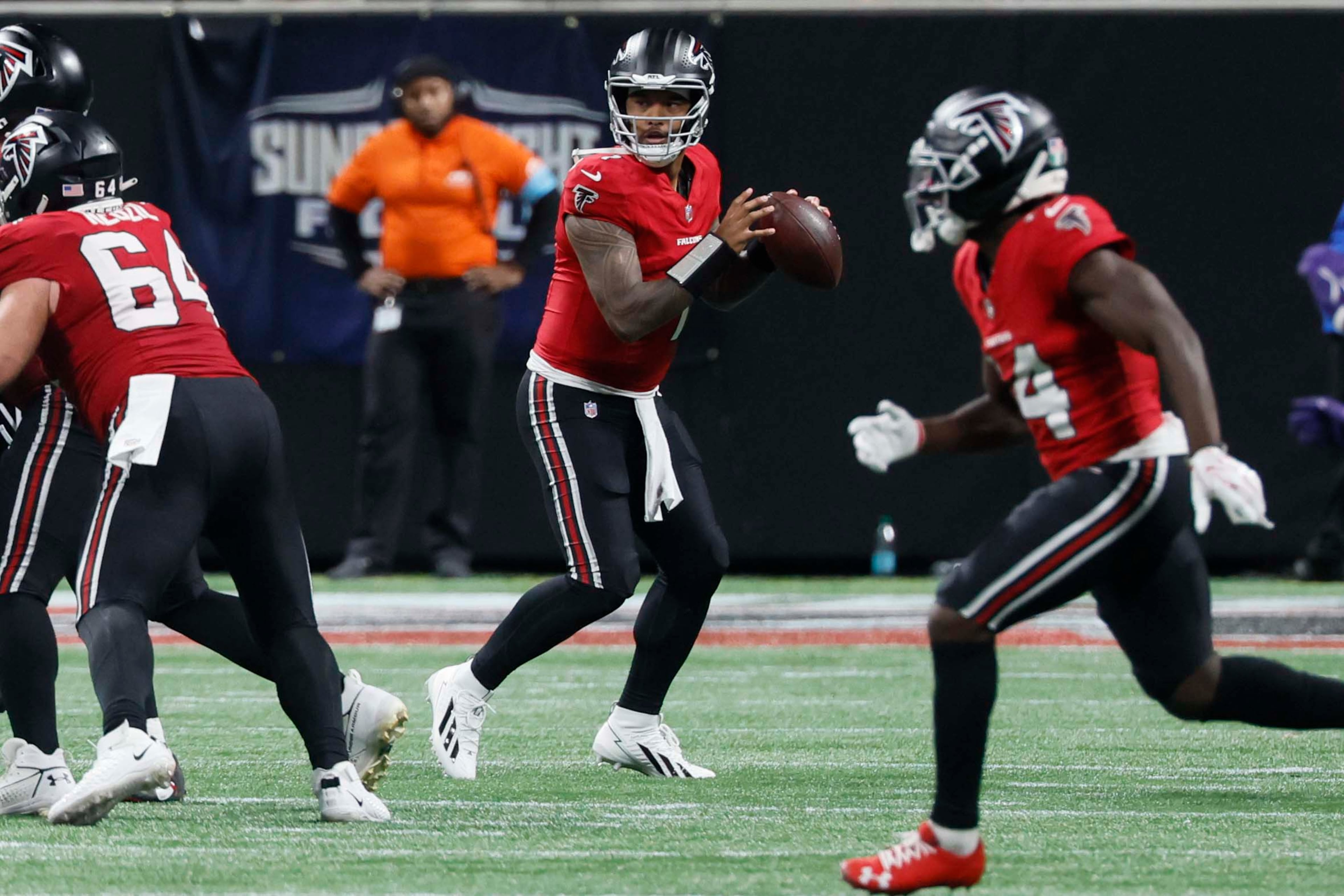 Atlanta Falcons quarterback Tua Tagovailoa (1) attempts a pass during the second half of a football game against the Baltimore Ravens at Mercedes-Benz Stadium in Atlanta, GA, on Sunday, Oct. 11, 2026. (Miguel Martinez/AJC)