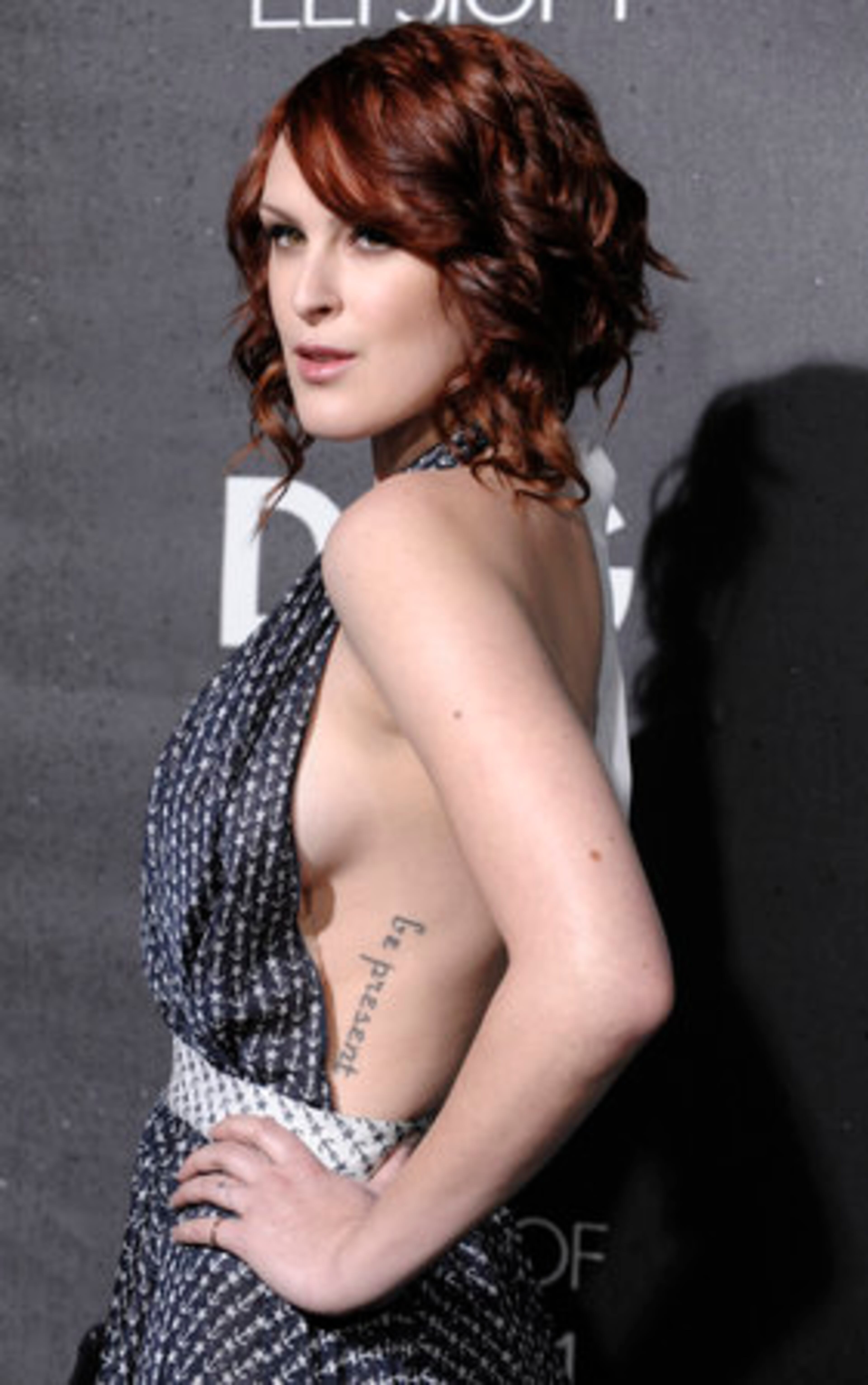 We're not sure whom actress Rumer Willis expected to be reading this tattoo.