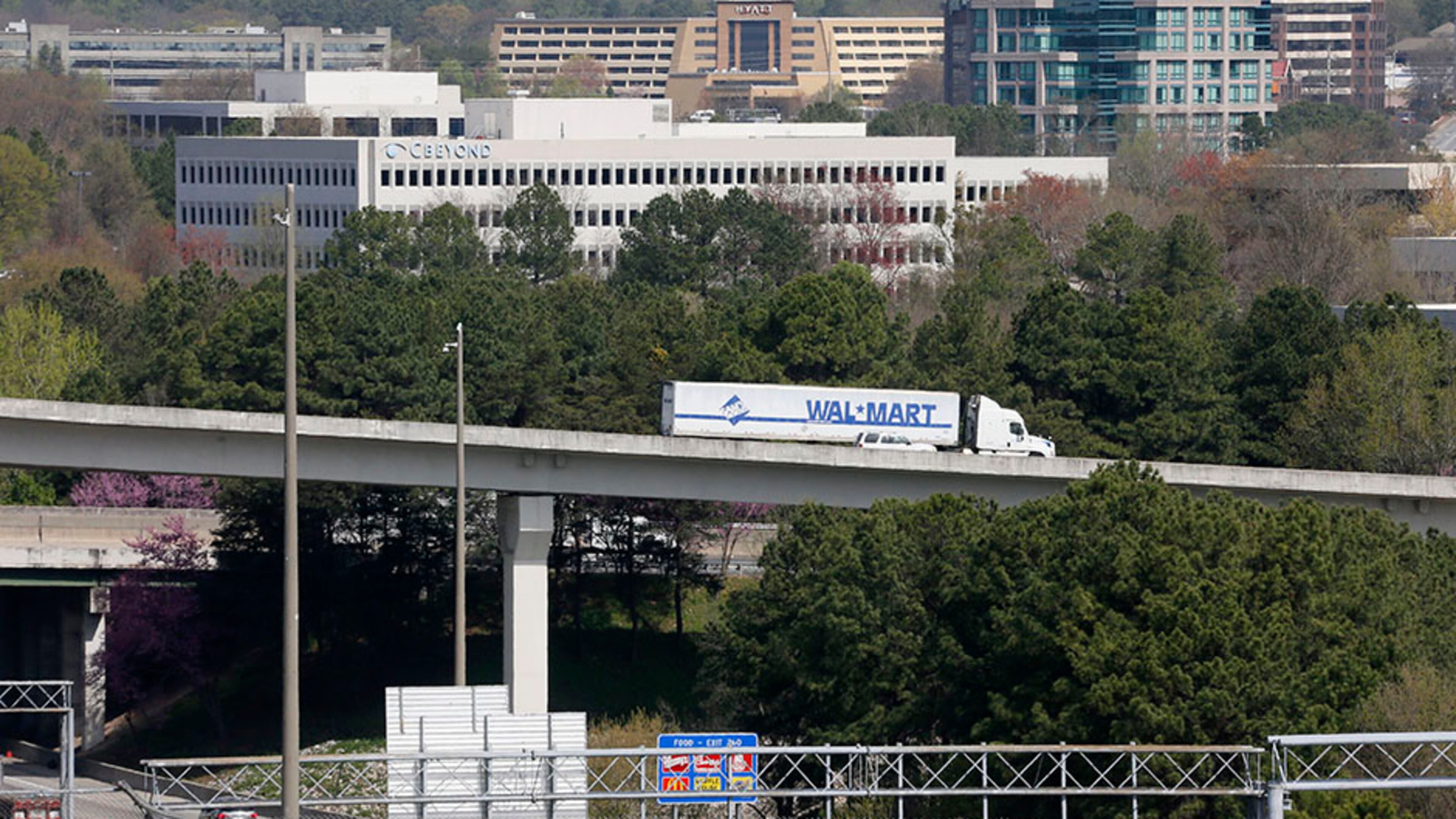 The business district that lured the Braves to Cobb County is looking at ways to link the new stadium site with amenities and parking solutions across the area near I-75 and I-285.
