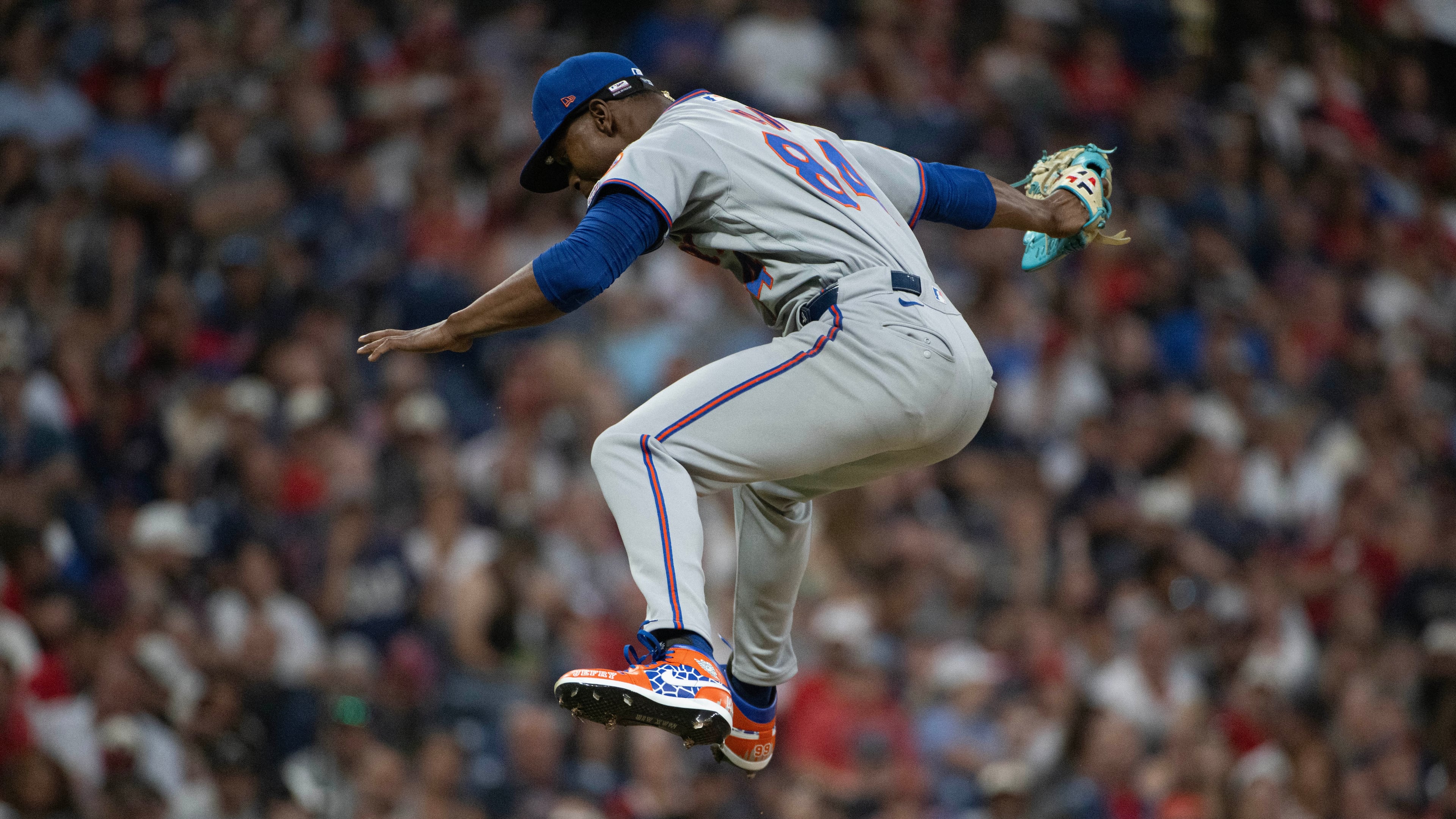 After striking out Cleveland Guardians' Angel Martinez during his Major League debut, New York Mets relief pitcher Jefry Yan reacts during the sixth inning of a baseball game, Wednesday, Aug. 5, 2026, in Cleveland. (AP Photo/Phil Long)