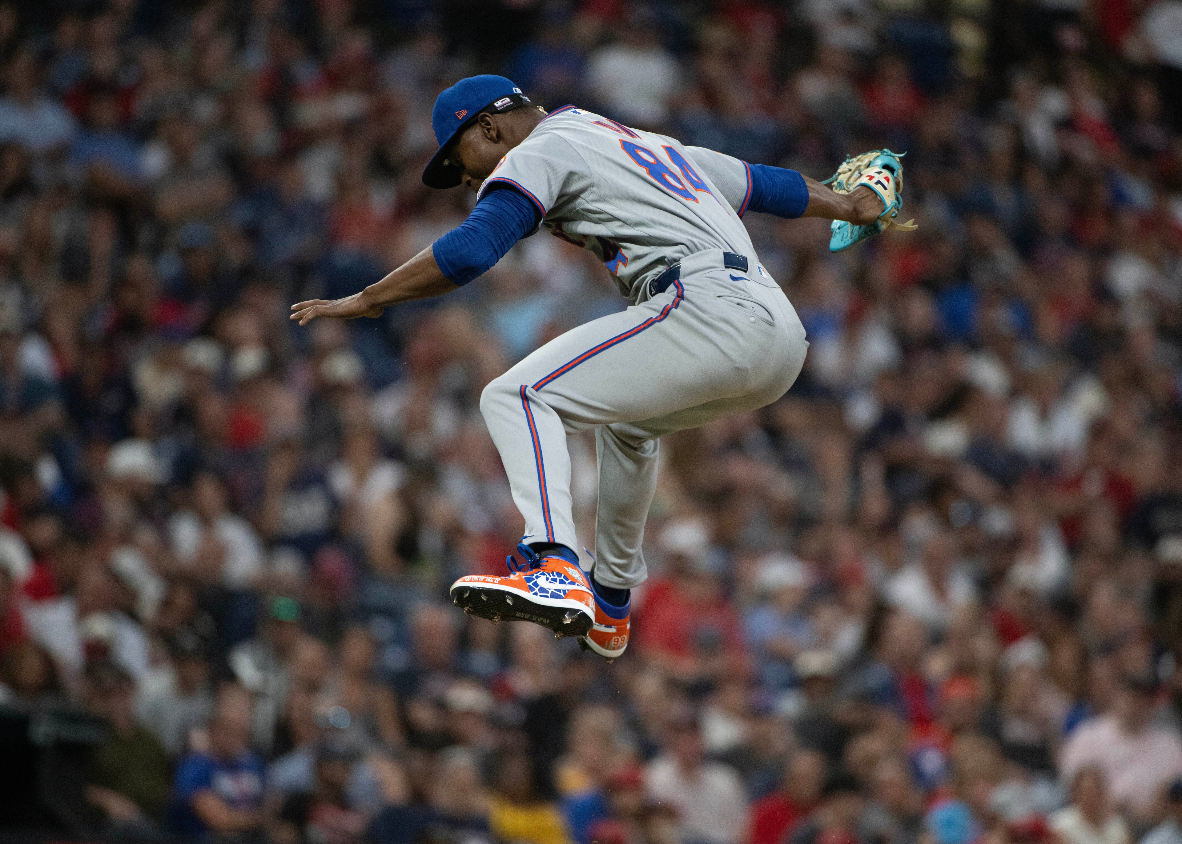 Mets relief pitcher Jefry Yan celebrates a strikeout during his MLB debut. (Phil Long/AP)