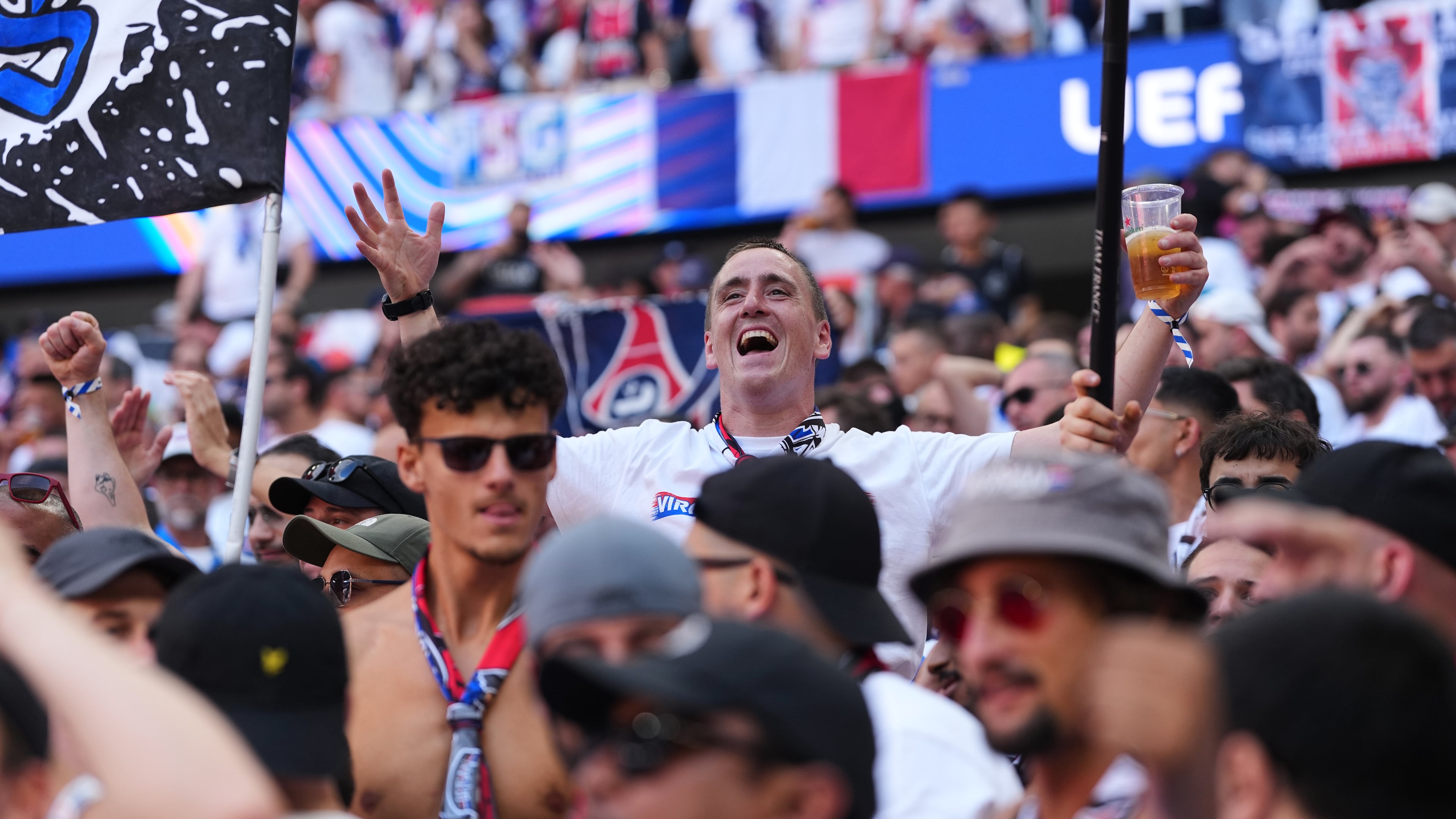 FILE - PSG fans cheer for their team before the Champions League final soccer match between Paris Saint-Germain and Arsenal in Budapest, Hungary, May 30, 2026. (AP Photo/Andreea Alexandru, File)