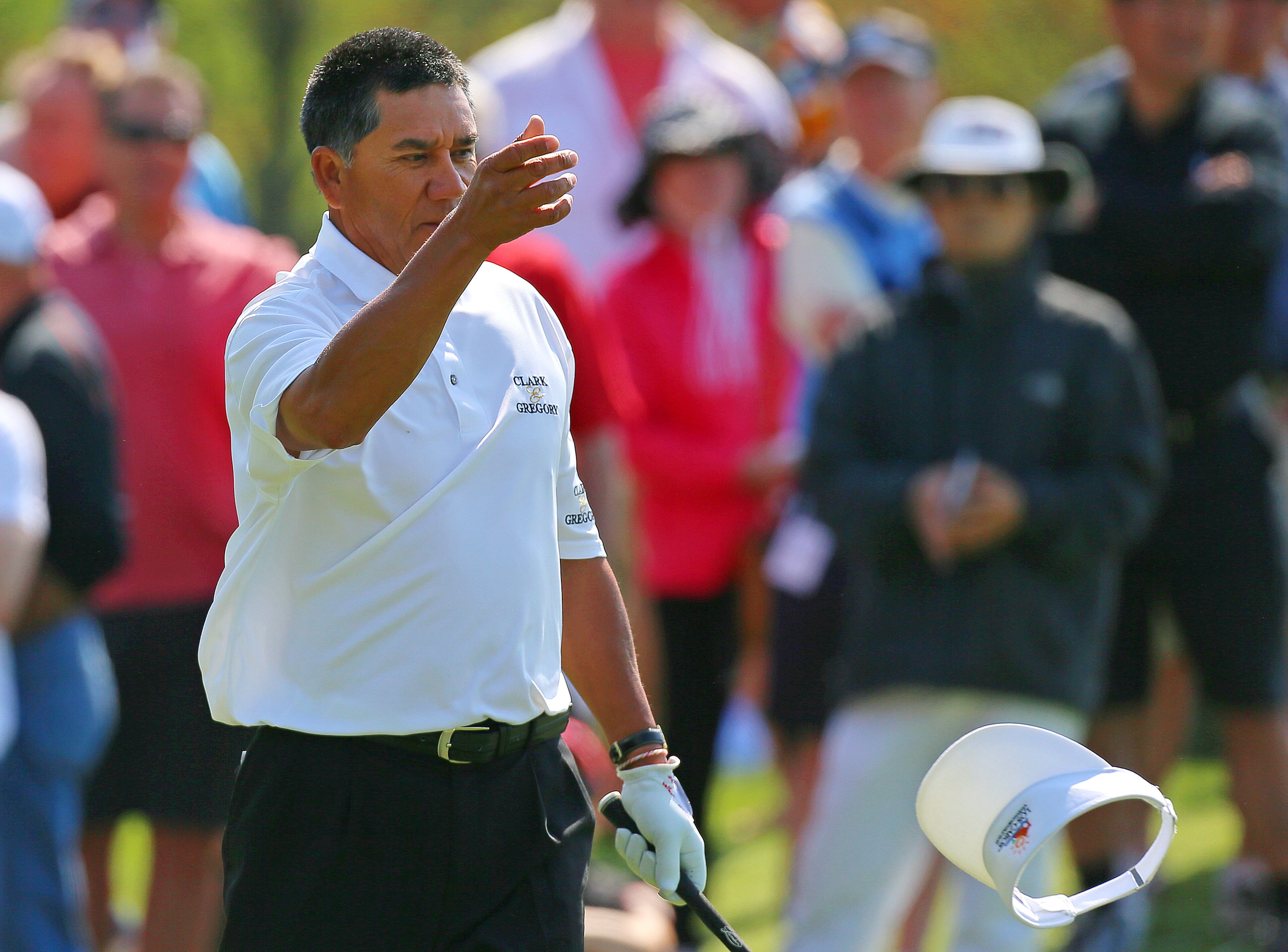 Esteban Toledo tosses his hat after nearly chipping in for a birdie from off the 10th green in the Greater Gwinnett Championship at TPC Sugarloaf. Toledo made par on the hole, but made a double bogey on the next two holes to fall from contention.