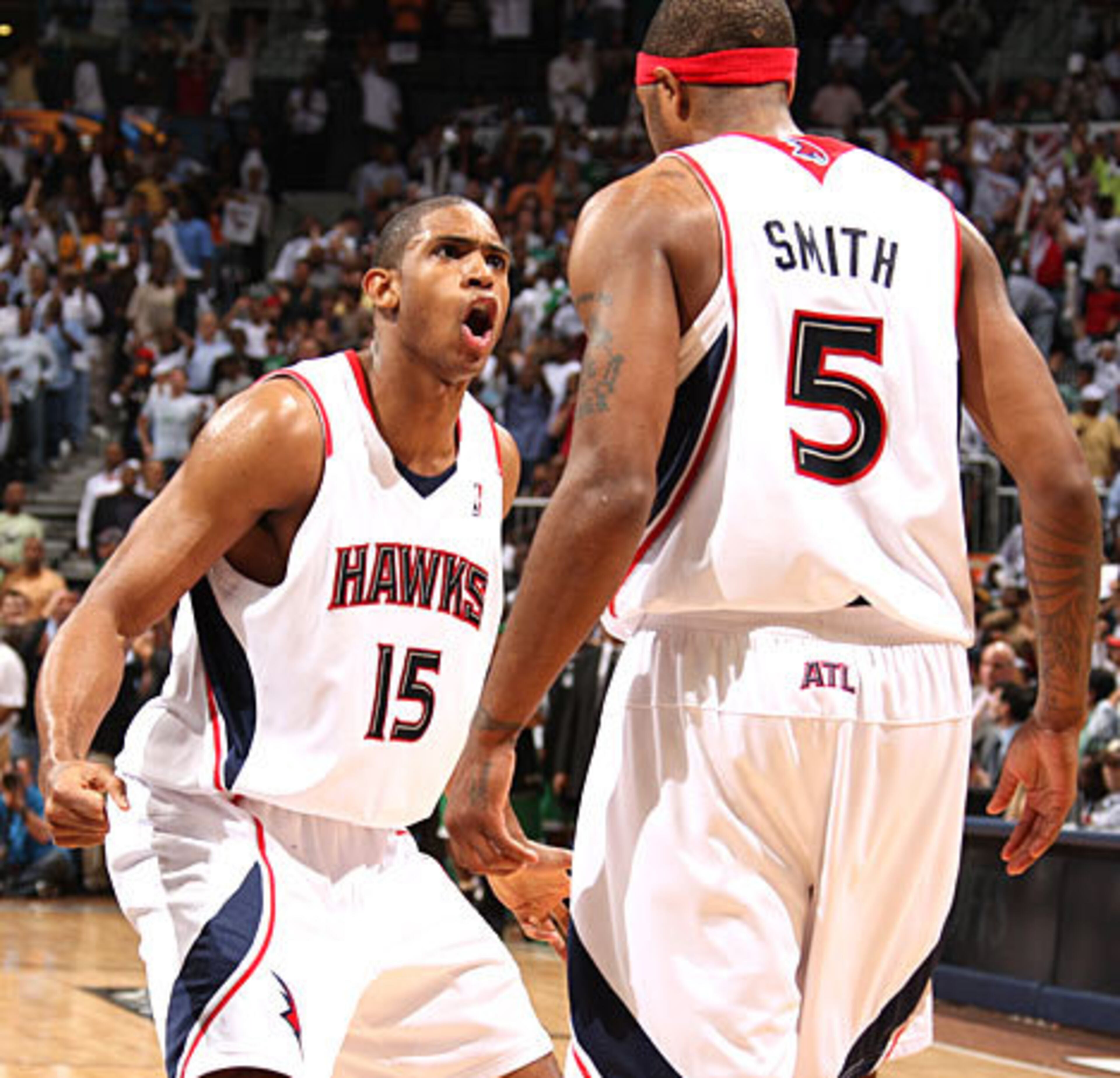 RIGHT: After showing glimpses of what they could do against bigger frontcourts, Josh Smith and Al Horford raise their games to new heights this season. It would enable the Hawks to play through their young frontcourt stars on their way to another playoff berth. The NBA finalists from last year (Boston and the Los Angeles Lakers) saw first hand just how dangerous these two budding stars can be when the Hawks turn their focus in that direction.