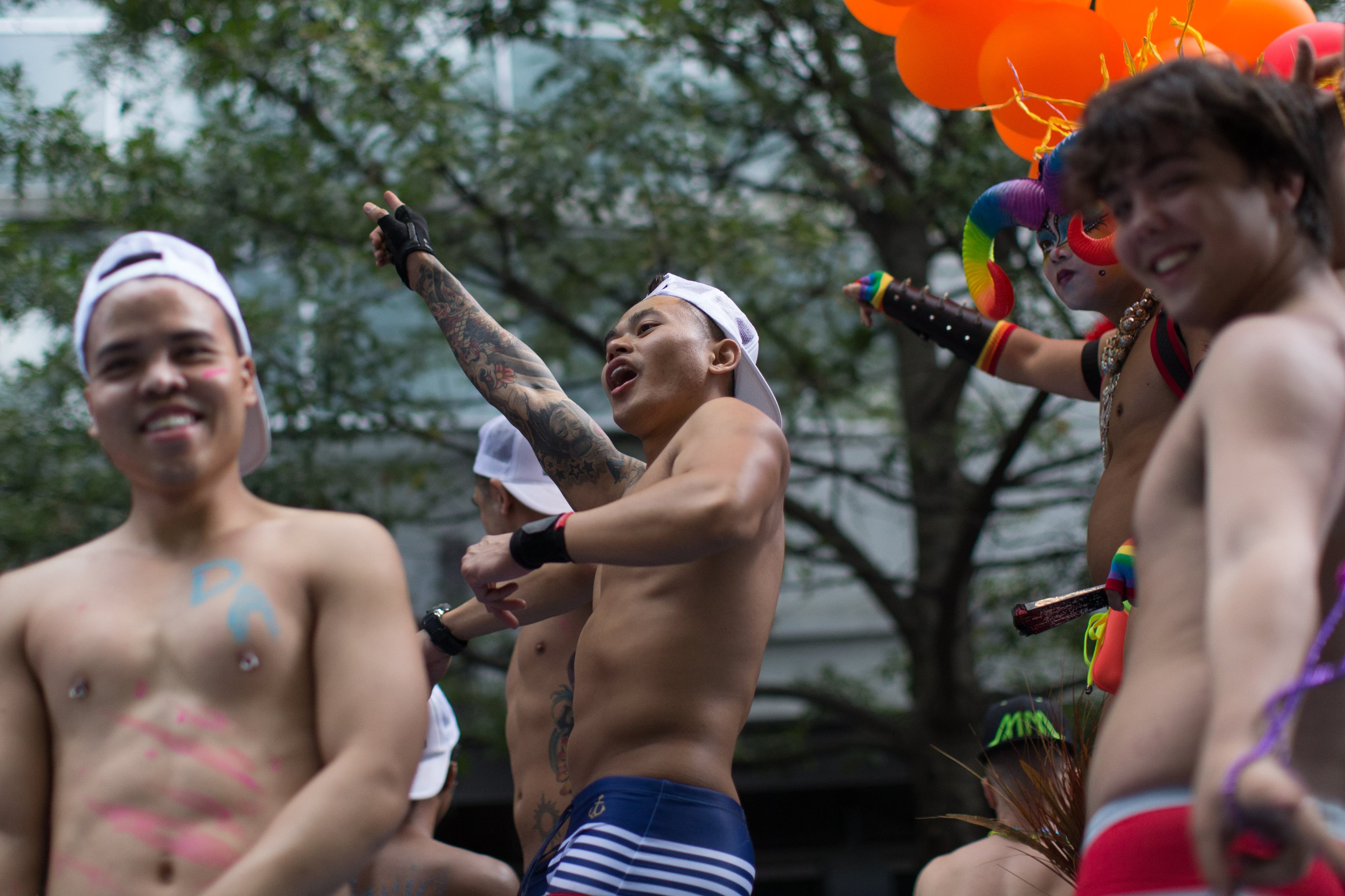 Members of the LGBT community dance on a parade float during the Atlanta Pride Parade, Sunday, Oct. 11, 2015. BRANDEN CAMP/SPECIAL
