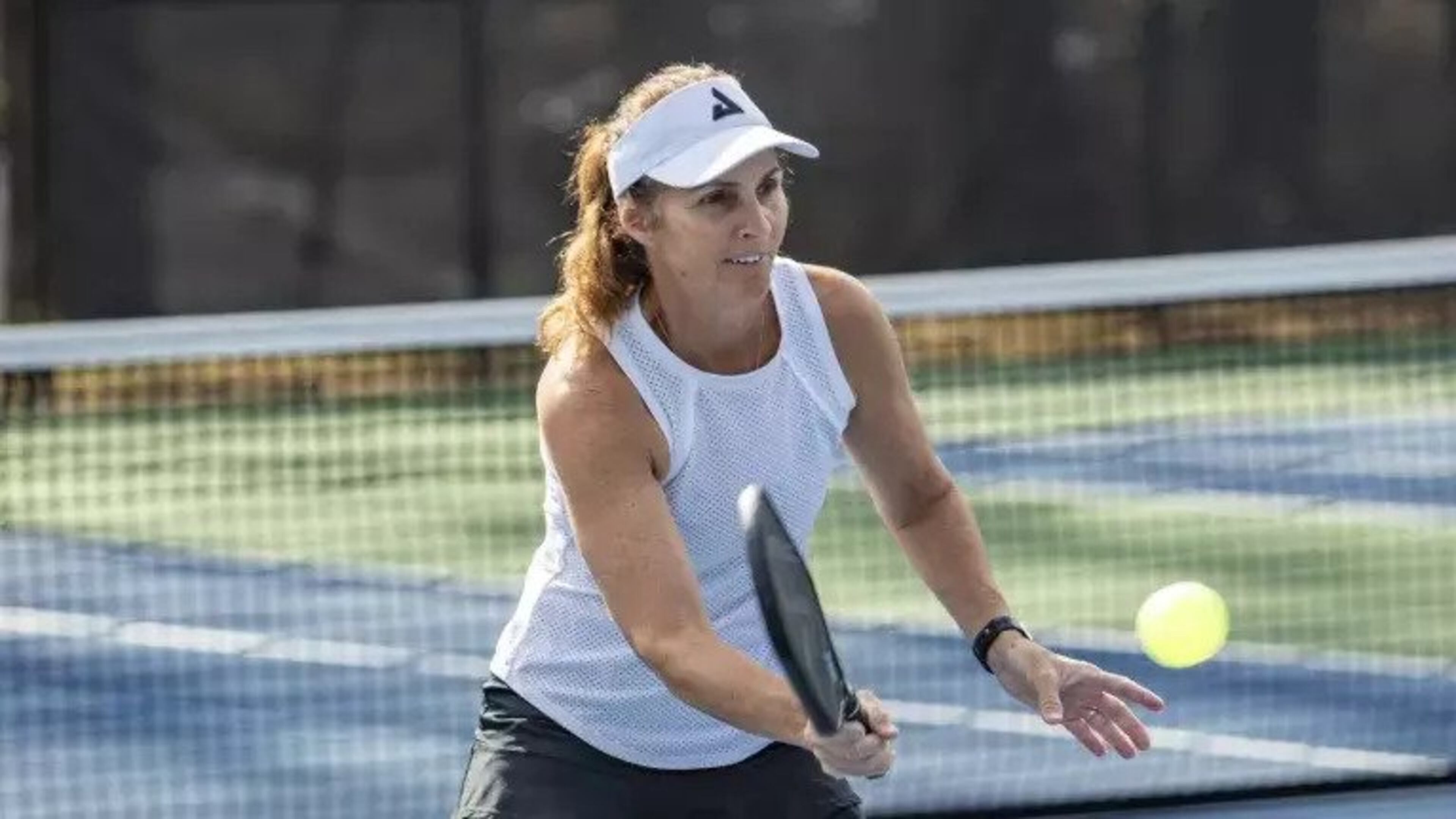 Angela Simon teaches a pickleball lesson at Hammond Park in Sandy Springs. (Photo by Isadora Pennington)