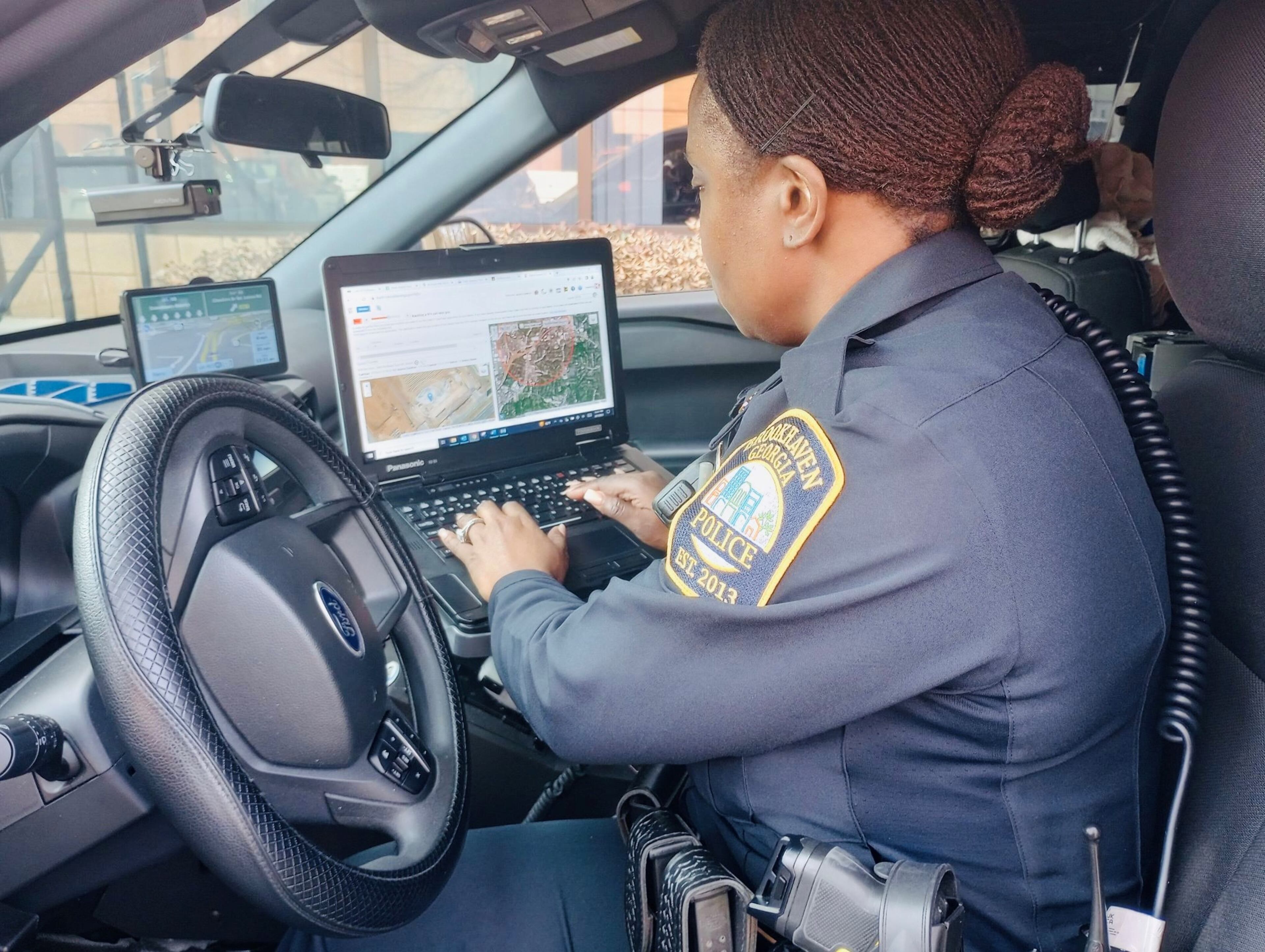 Officer A. Hawkins with the Brookhaven Police Department uses the Live911 technology, which was introduced in October.