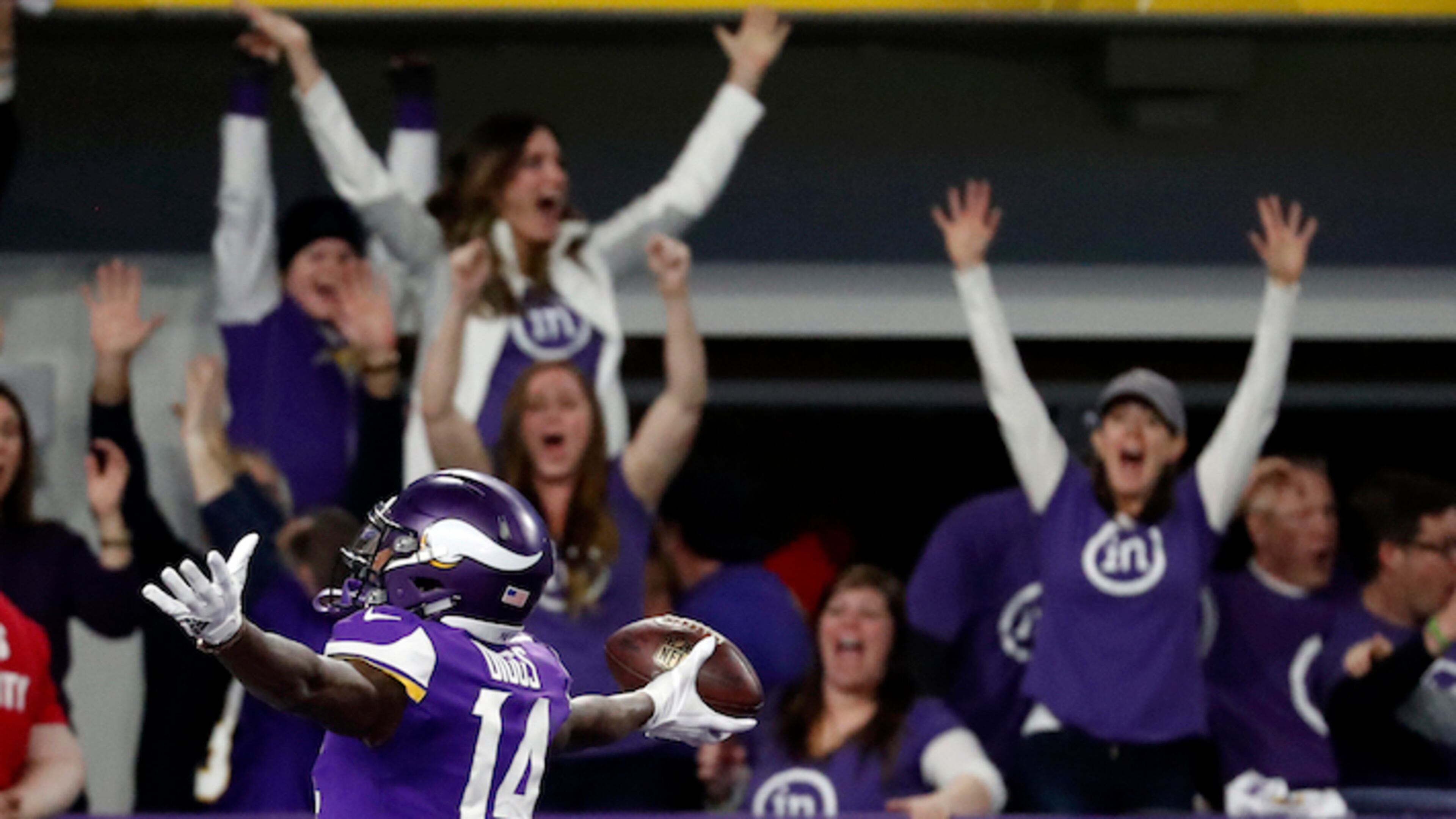 Minnesota Vikings wide receiver Stefon Diggs (14) celebrates in the end zone after a game winning touchdown against the New Orleans Saints during the second half of an NFL divisional football playoff game in Minneapolis, Sunday, Jan. 14, 2018. The Vikings defeated the Saints 29-24. (AP Photo/Jeff Roberson)