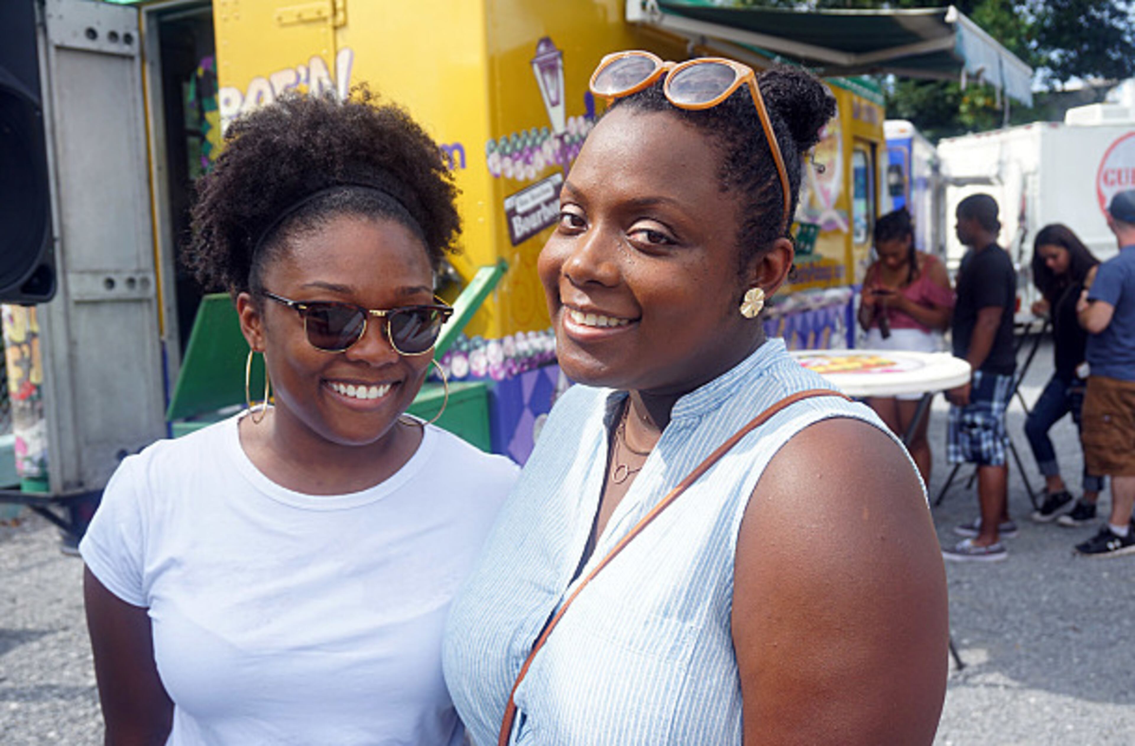 Ashley Hanna-Holloway (left) and Katherina Ferguson Brown take a moment for a picture at the first all black owned Atlanta Food Truck Park.