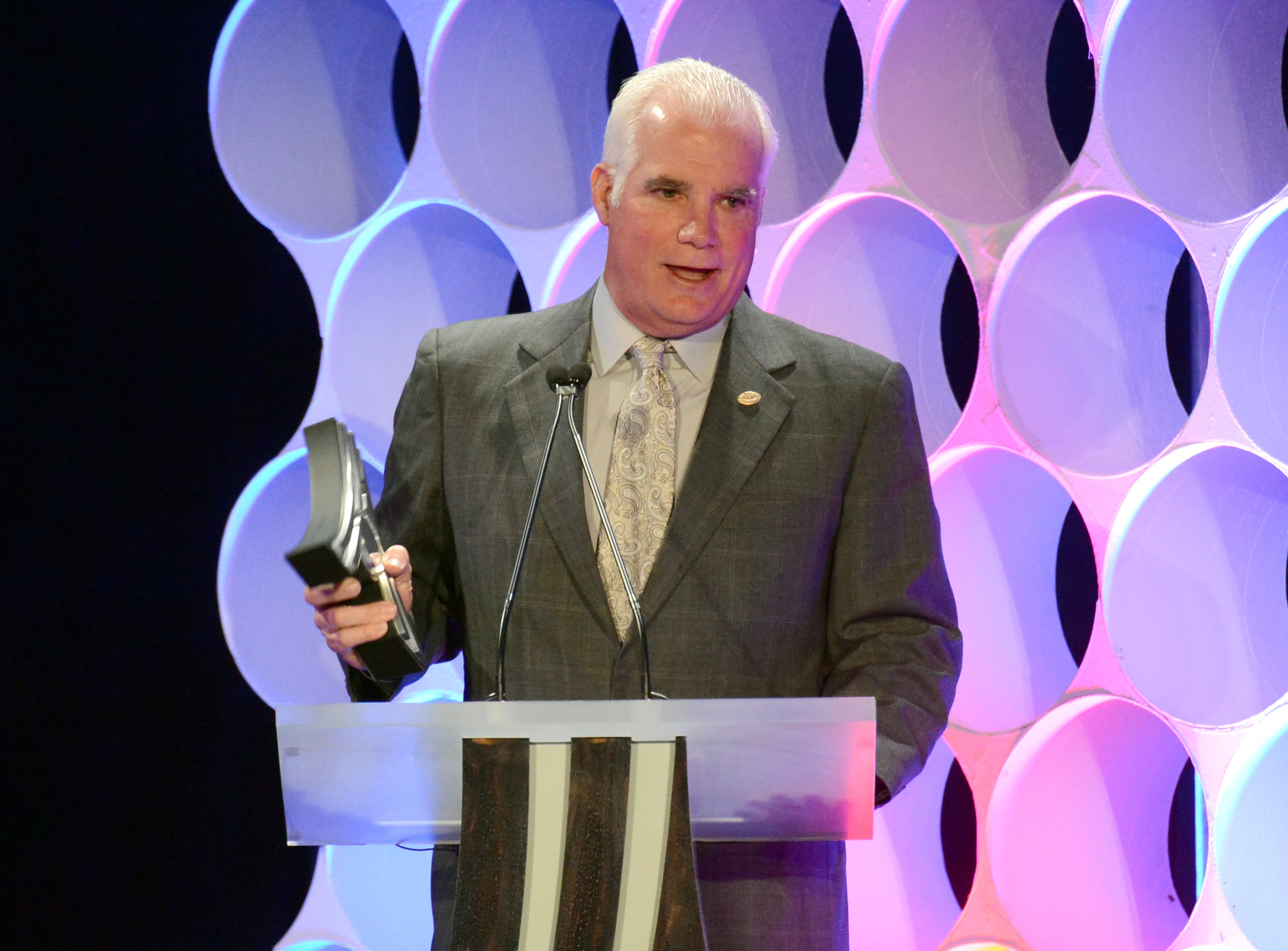 Atlanta Falcons head coach Mike Smith accepts the Coach of the Year presented by The Home Depot during the 8th annual Atlanta Sports Awards.