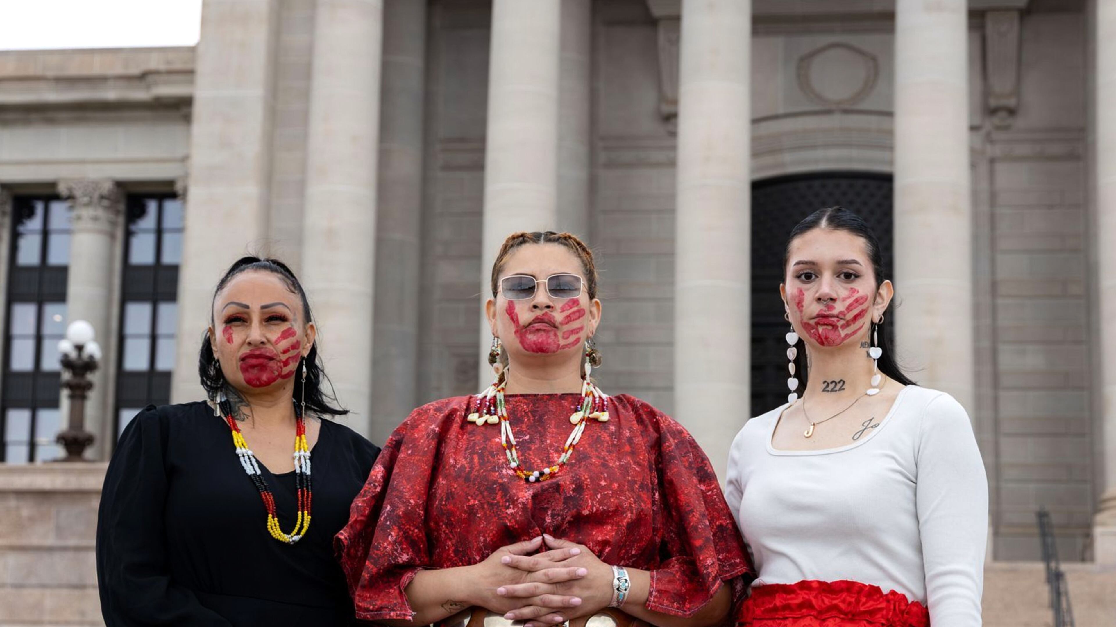 Theda Moreno, Cassandra Fraser and Tatum Escott attend an event to honor and raise awareness for Indigenous people who are missing or who have been killed, Tuesday, May 5, 2026, in Oklahoma City. (Sarah Liese/KOSU via AP)
